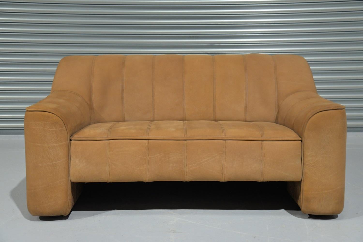 Discounted airfreight for our US and International customers (from 2 weeks door to door)

We are delighted to bring to you a vintage 1970`s De Sede DS 44 two-seat sofa or loveseat in thick buffalo leather with a soft silky texture similar to suede.