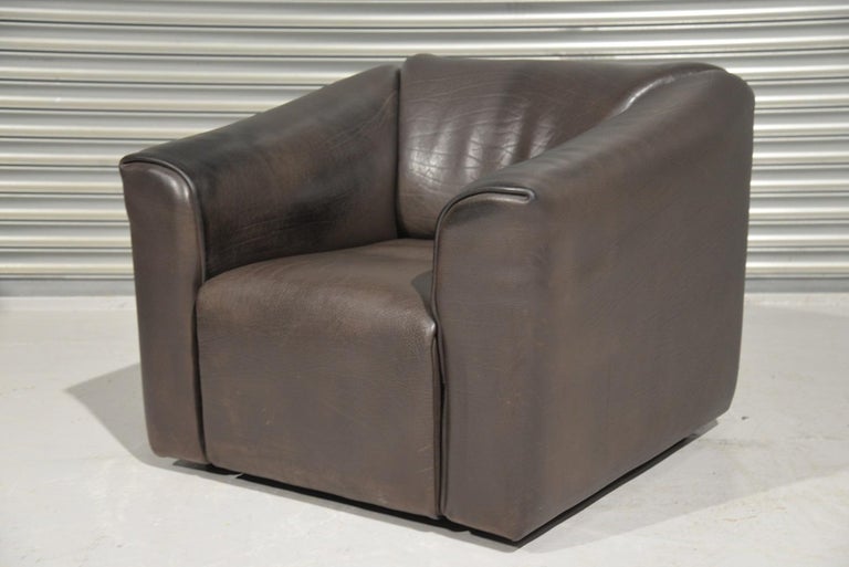 We are delighted to bring to you an ultra rare vintage De Sede DS 47 armchair. Hand built in the 1970s by De Sede craftsman in Switzerland, this piece is upholstered in thick dark brown 5mm neck leather with characterful folds. The pieces are