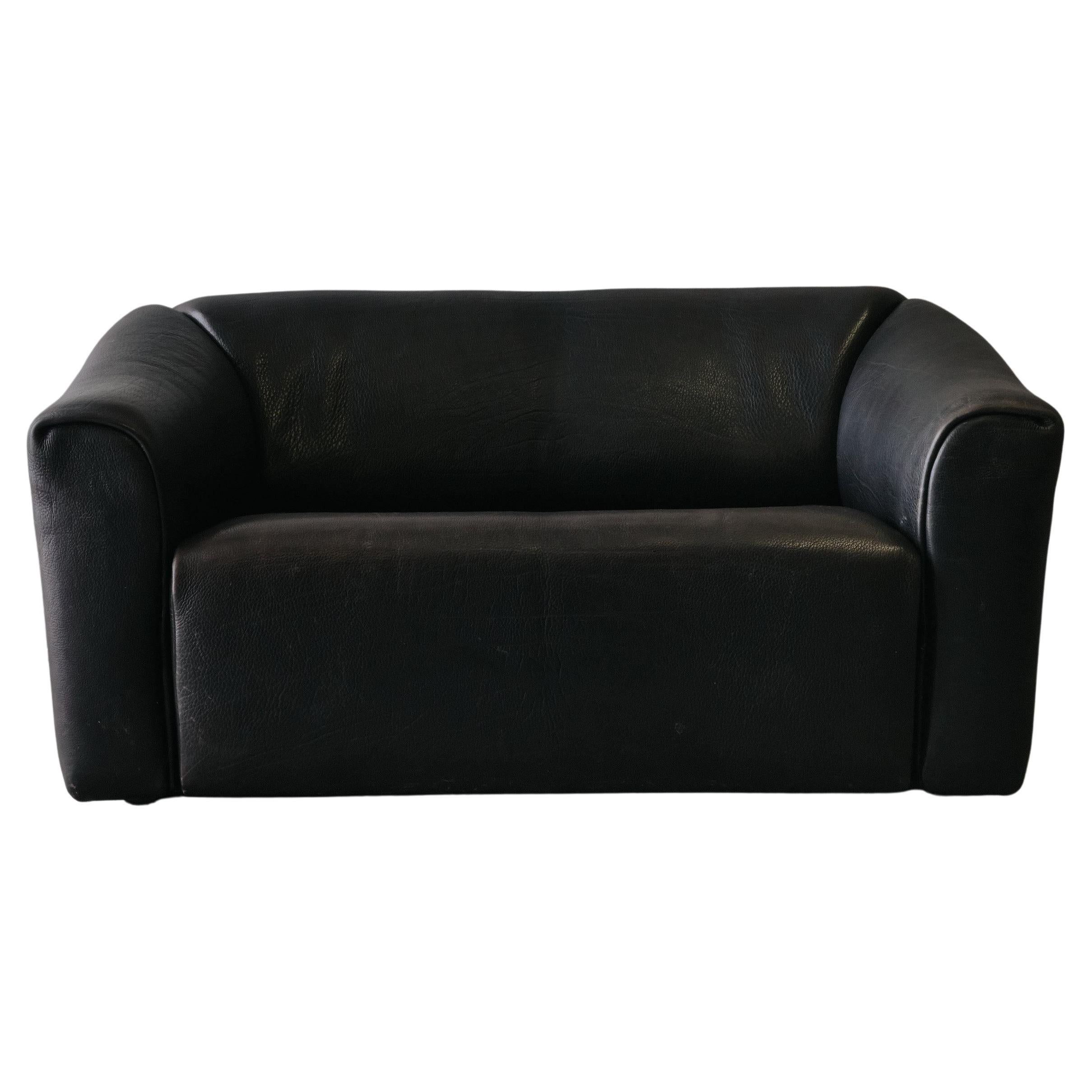 Vintage De Sede DS-47 Sofa In Black Leather, From Switzerland, Circa 1970.  Nice model in original black leather with very light wear and use.  Seat extends 6