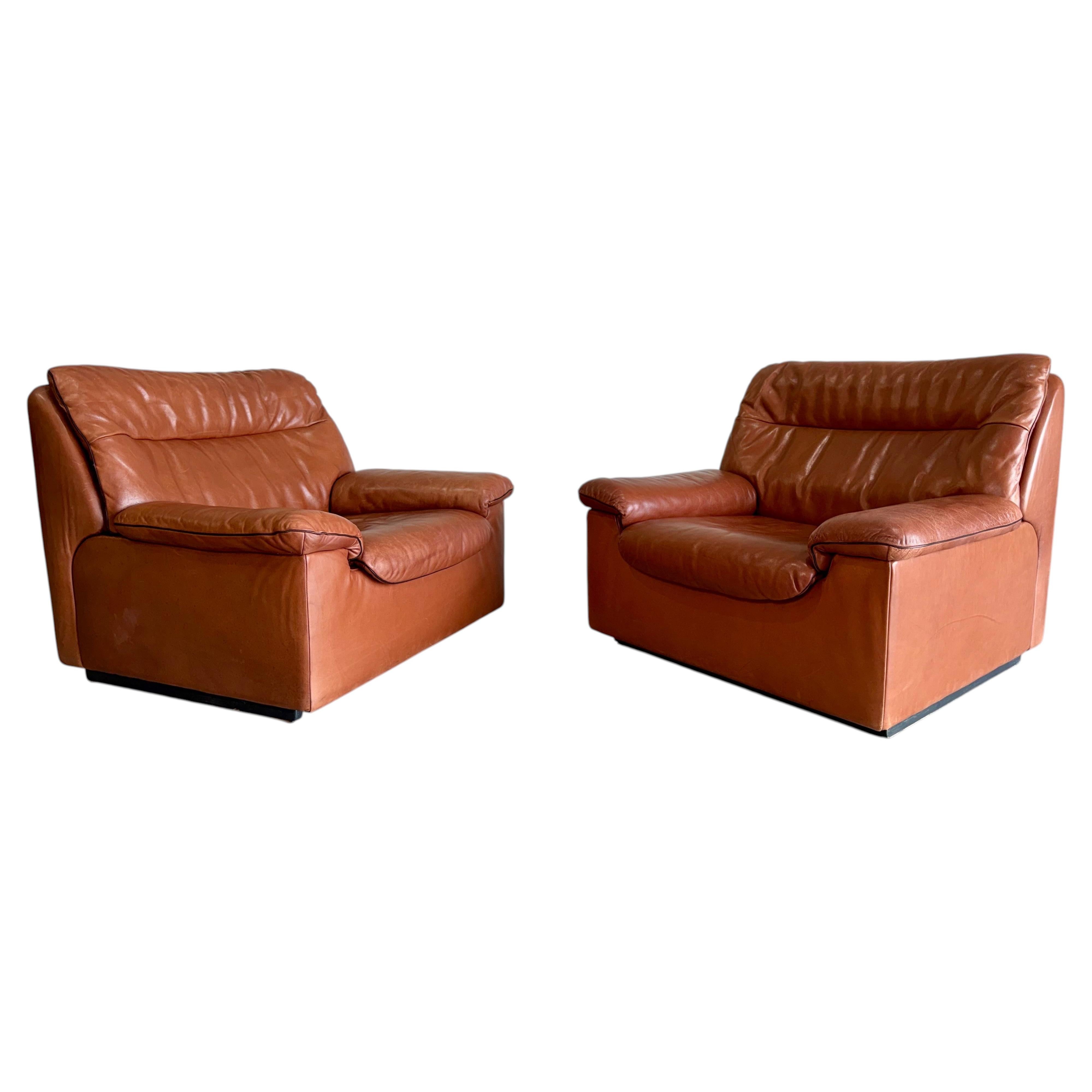 Coppia di poltrone vintage De Sede DS-66 in pelle marrone, Svizzera, anni '70 circa in vendita