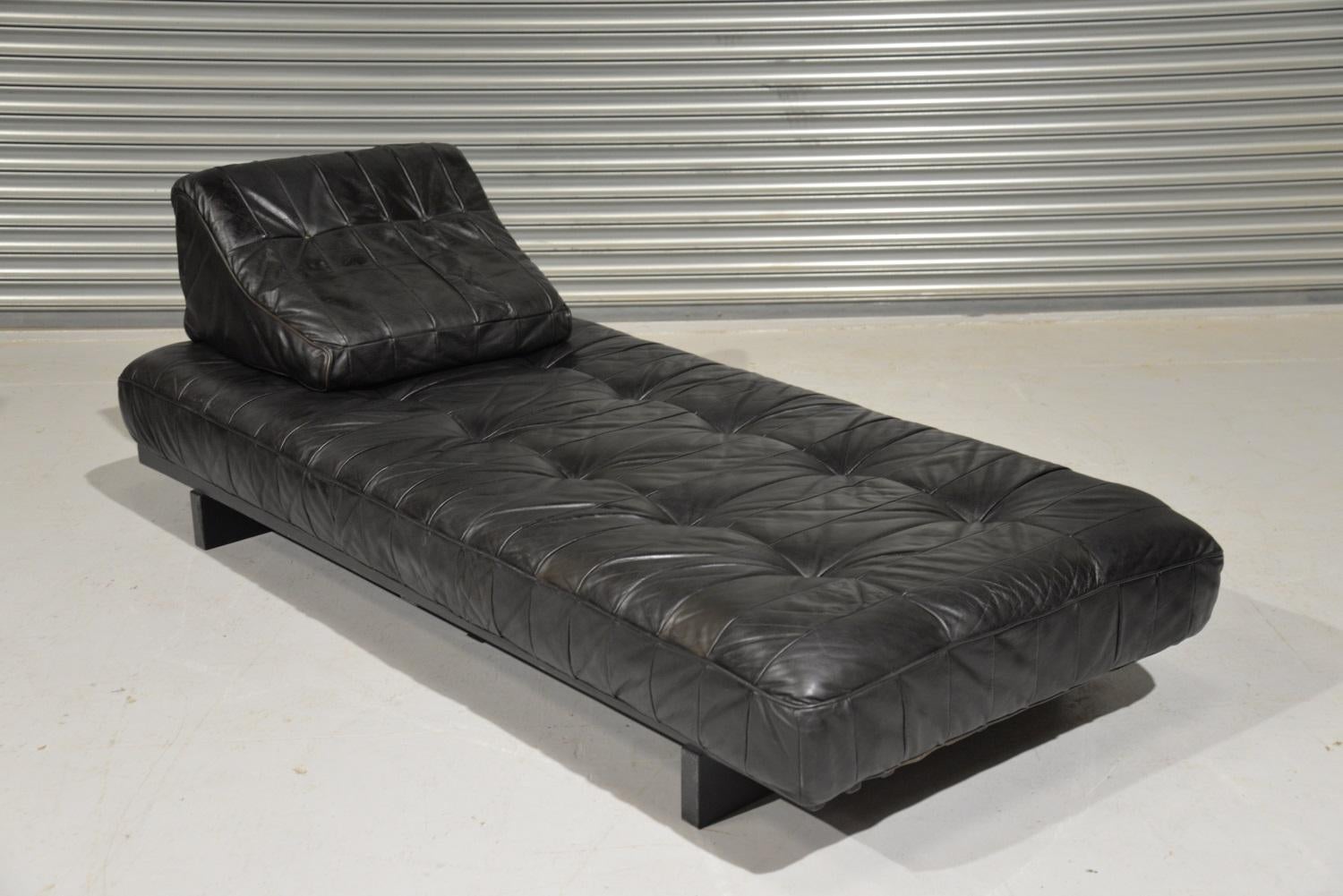 We are delighted to bring to you an extremely rare and highly desirable original vintage daybed. Hand built in the 1960s by De Sede craftsman in Switzerland and upholstered in stunning soft patchwork aniline leather. The daybed is extremely