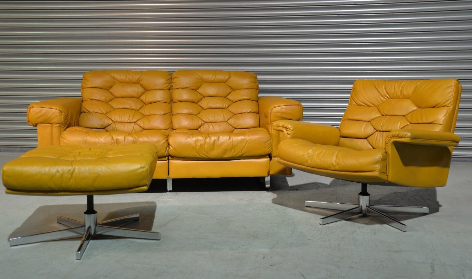 Discounted airfreight for our US and International customers ( from 2 weeks door to door ) 

We are delighted to bring to you a beautiful two-seat reclining sofa, matching swivel armchair and ottoman from De Sede of Switzerland. Designed by Robert