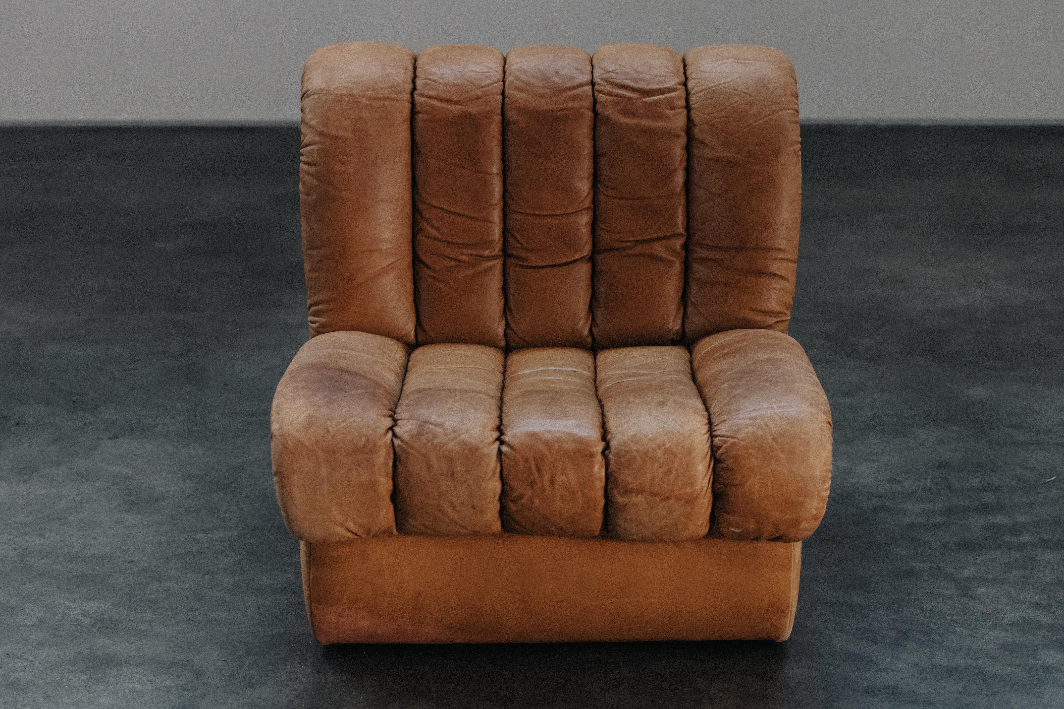 Vintage De Sede DS85 Lounge Chair aus der Schweiz, CIRCA 1970.  Originale cognacfarbene Lederpolsterung mit großer Patina und Gebrauchsspuren.