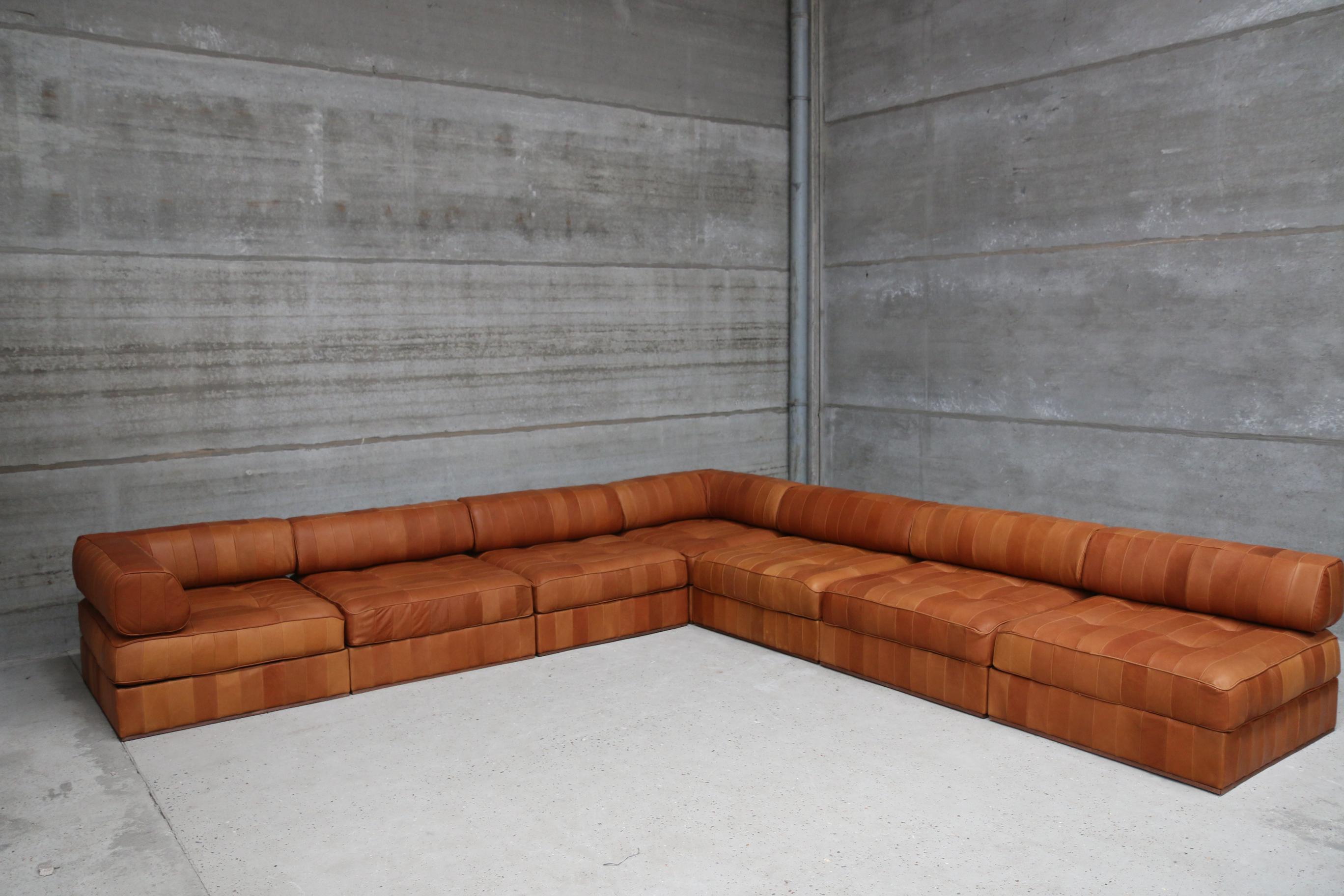 Iconic ds88 modular patchwork sofa restored in our signature vintage aniline leather. New quality foam and new leather. You can play with the modular composition of the sofa. This set consists of 7 modules, 5 normal modules and 2 corner L