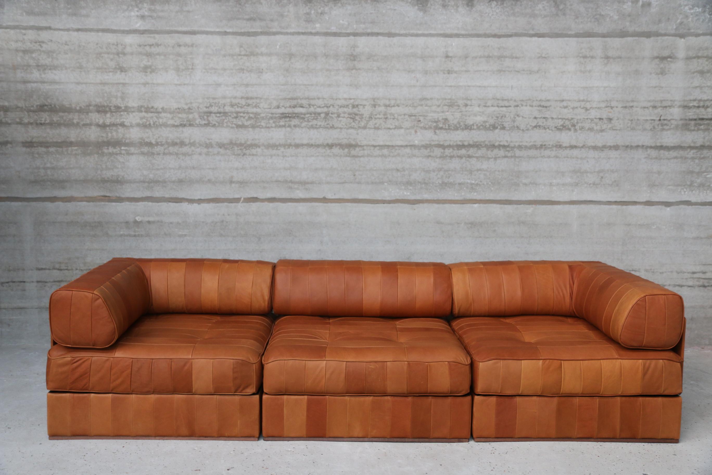 Iconic De Sede DS88 modular patchwork sofa restored in our signature vintage aniline leather by our company, Denmark. New foam and new leather. You can play with the modular composition of the sofa.
See pictures for dimensions and how its build up