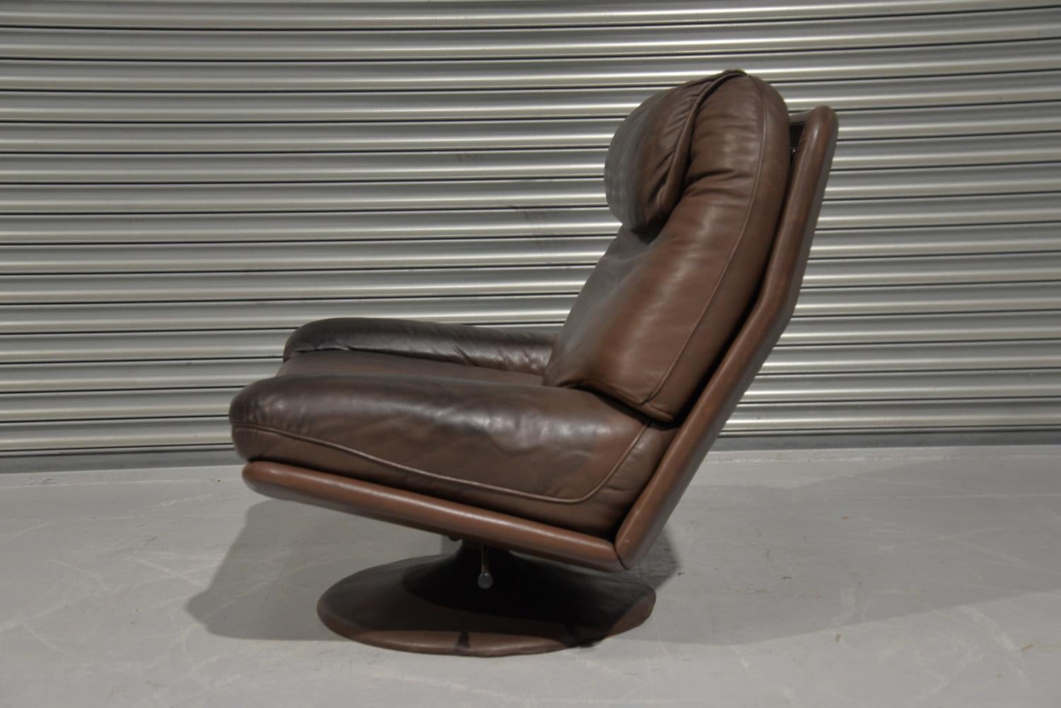 Leather Vintage De Sede Lounge Swivel Armchair and Ottoman, Switzerland 1980`s For Sale
