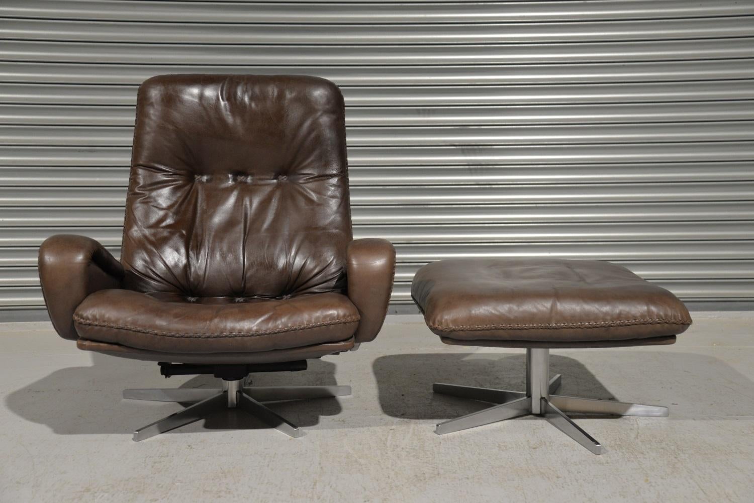 We are delighted to bring to you an ultra-rare and highly desirable vintage 1960s De Sede S 231 James Bond swivel leather armchair with ottoman. This same swivel leather armchair and ottoman were used as a prop in the 1969 James Bond film, On Her