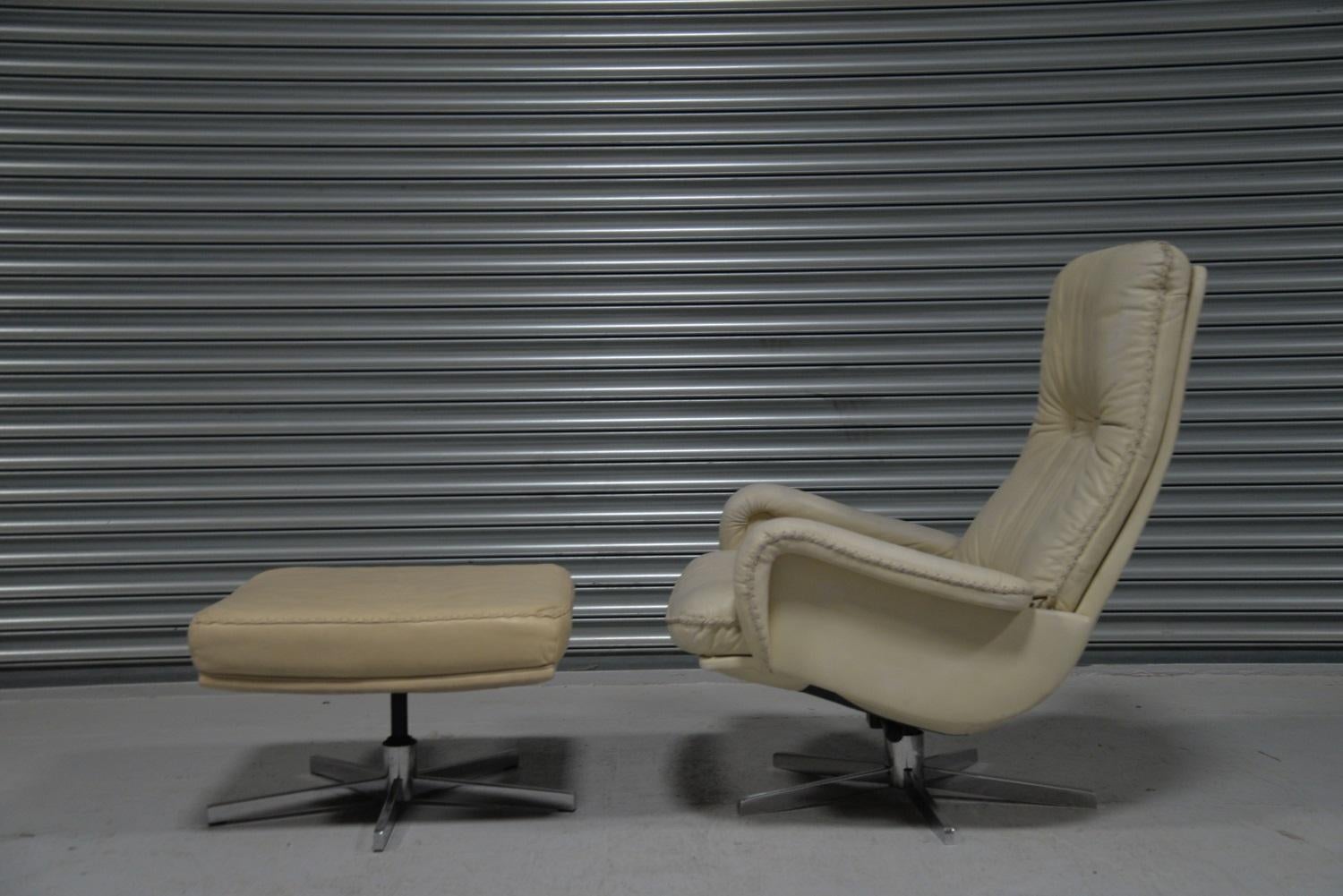 We are delighted to bring to you an ultra-rare and highly desirable De Sede S 231 vintage swivel armchair and ottoman. Built in the late 1960s by De Sede craftsman from Switzerland this same chair was used as a prop in the 1969 James Bond film, On