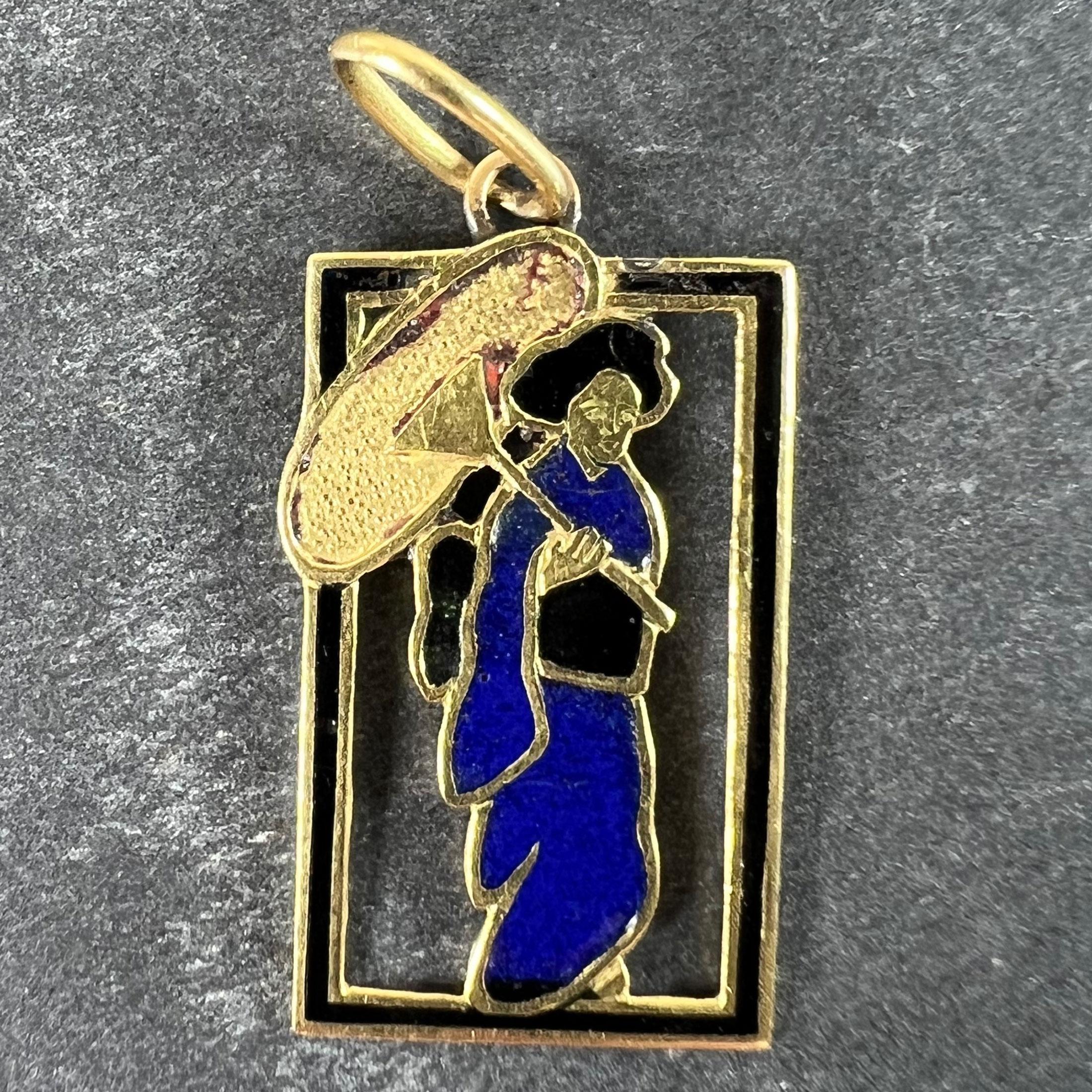 A vintage Art Deco 18 karat (18K) yellow gold charm pendant set with blue and black enamel designed as a Japanese Lady or Geisha in a Kimono with a parasol within a black enamel rectangular frame. Unmarked but tested for 18 karat gold.
 
Dimensions: