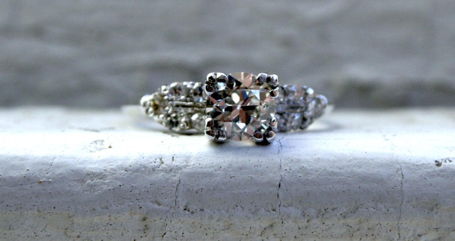 I seriously need to stop falling in love with engagement rings - but it's so hard when looking at this Beautiful Vintage Diamond Engagement Ring. It's just so sparkly and classic and perfect! Crafted in Platinum, the ring features a classic double