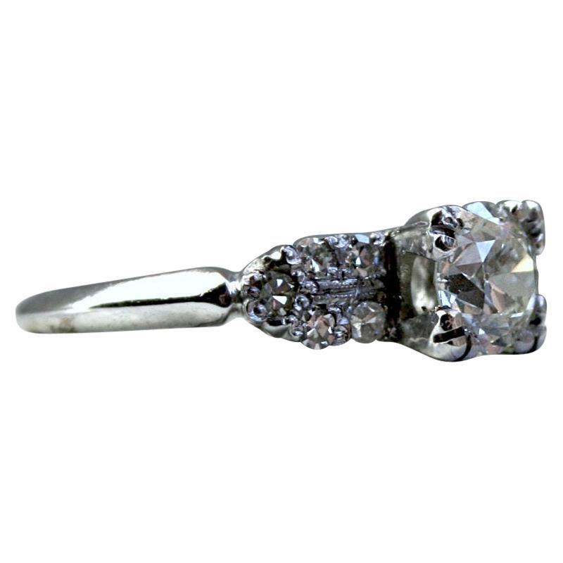 Vintage Deco Platinum Diamond Engagement Ring with GIA Certified 1.02 Carat For Sale
