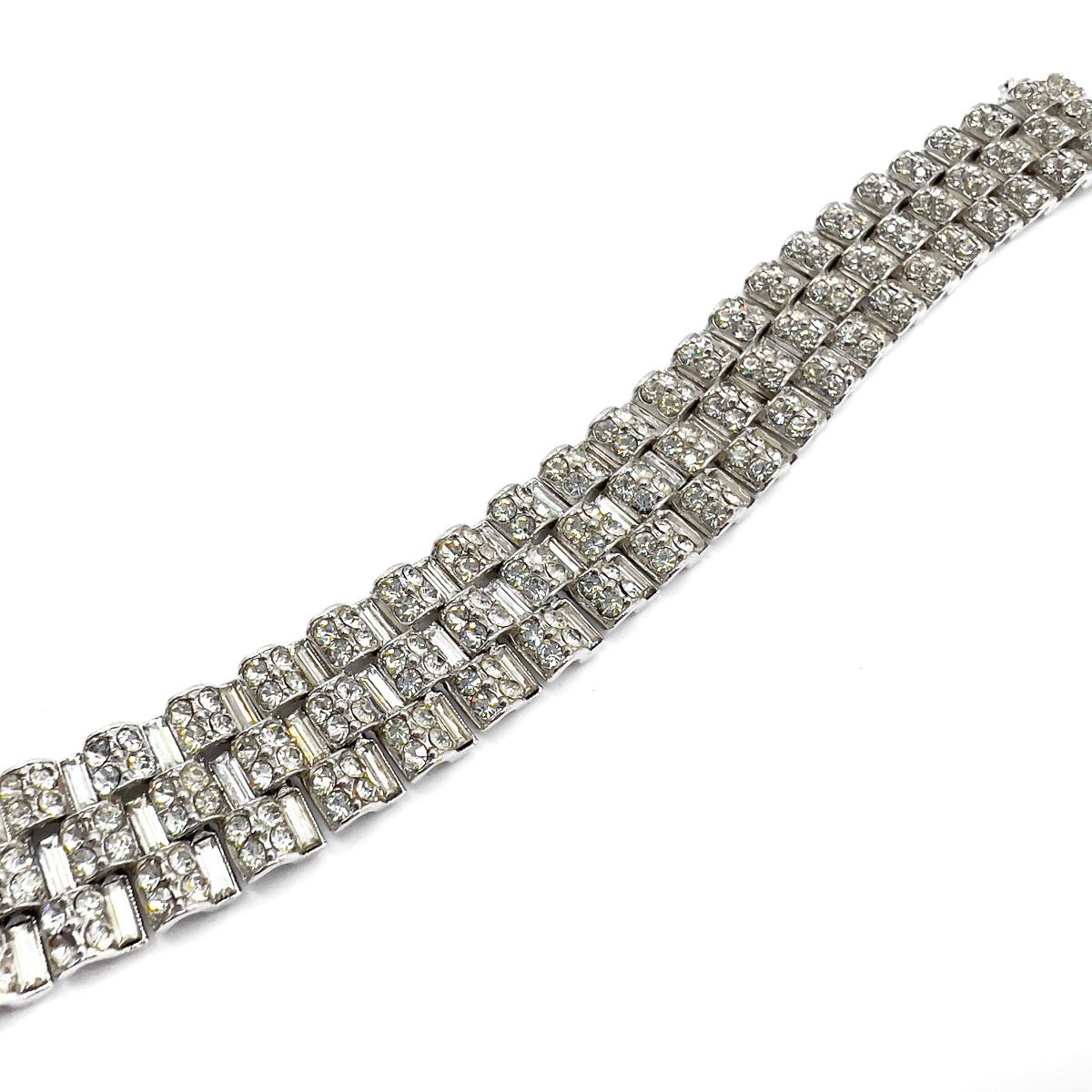 A super stylish Vintage Deco Tank Track Bracelet. Inspired by the earlier Art Deco cocktail bracelets, this mid century piece of wearable art is a killer style classic that will prove itself time and time again.  
An unsigned beauty. A rare