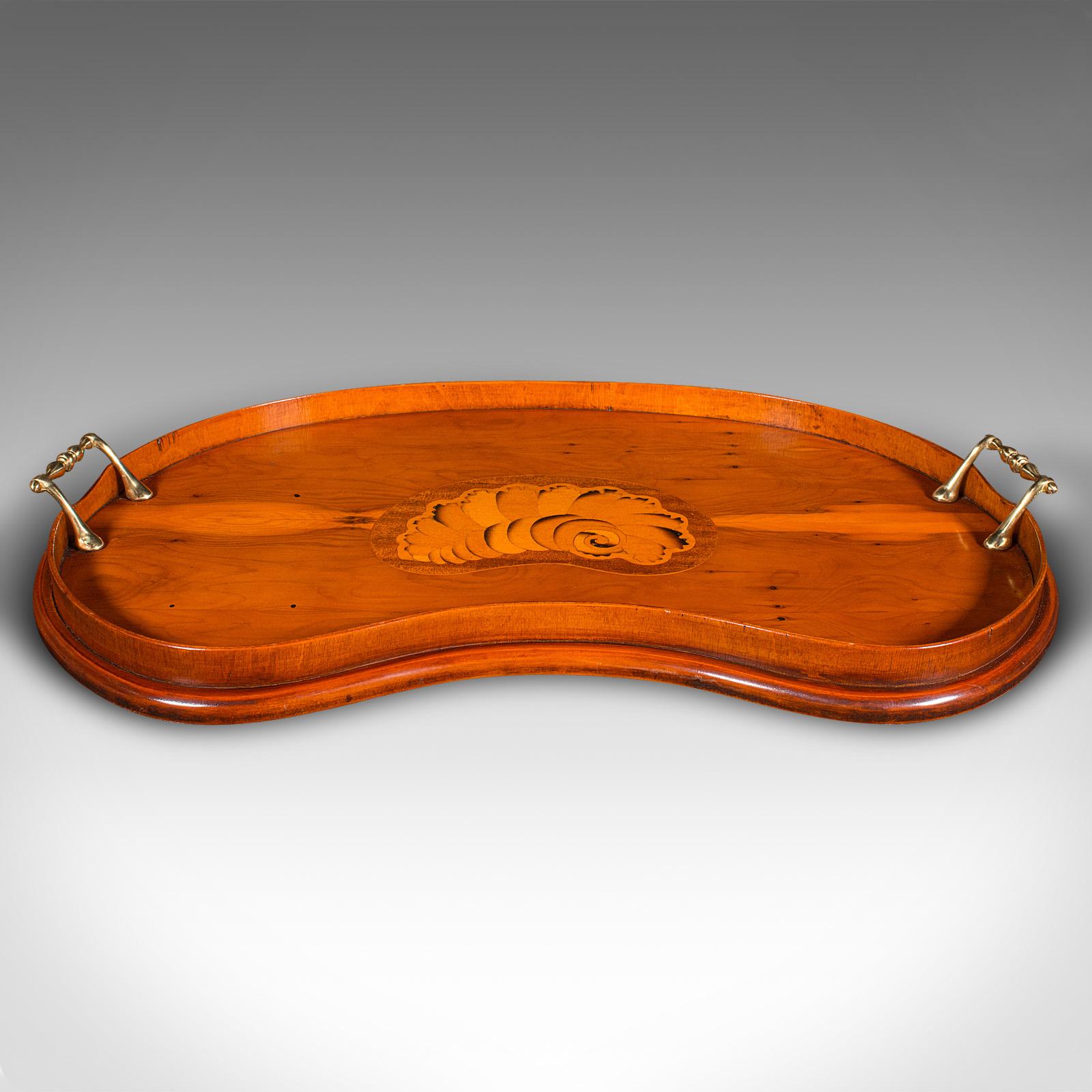 This is a vintage decorative afternoon tea tray. An English, yew and mahogany inlaid serving platter in Regency revival taste, dating to the late 20th century, circa 1980.

Delightful revival craftsmanship, ideal for social gatherings
Displays a