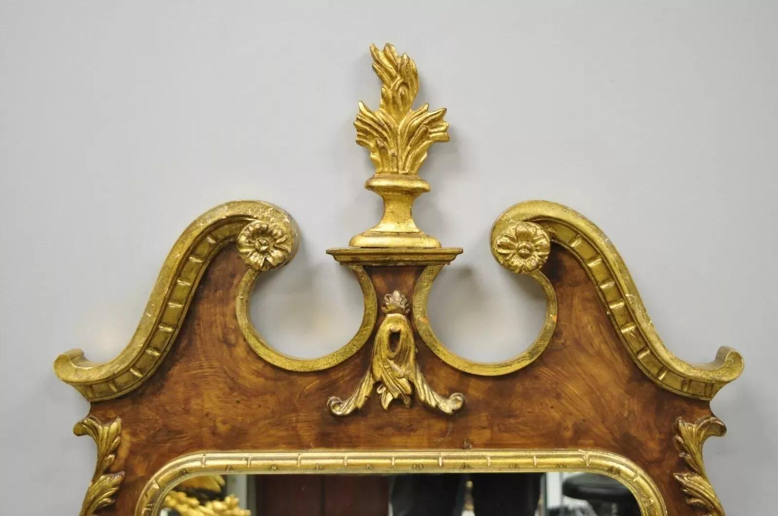 Vintage Decorative Crafts Inc American Federal Carved Wood Gold Gilt Wall Mirror. Item features gold gilt and brown distress painted finish, carved finials, solid wood frame, nicely carved details, original label, great style and form. Circa Late