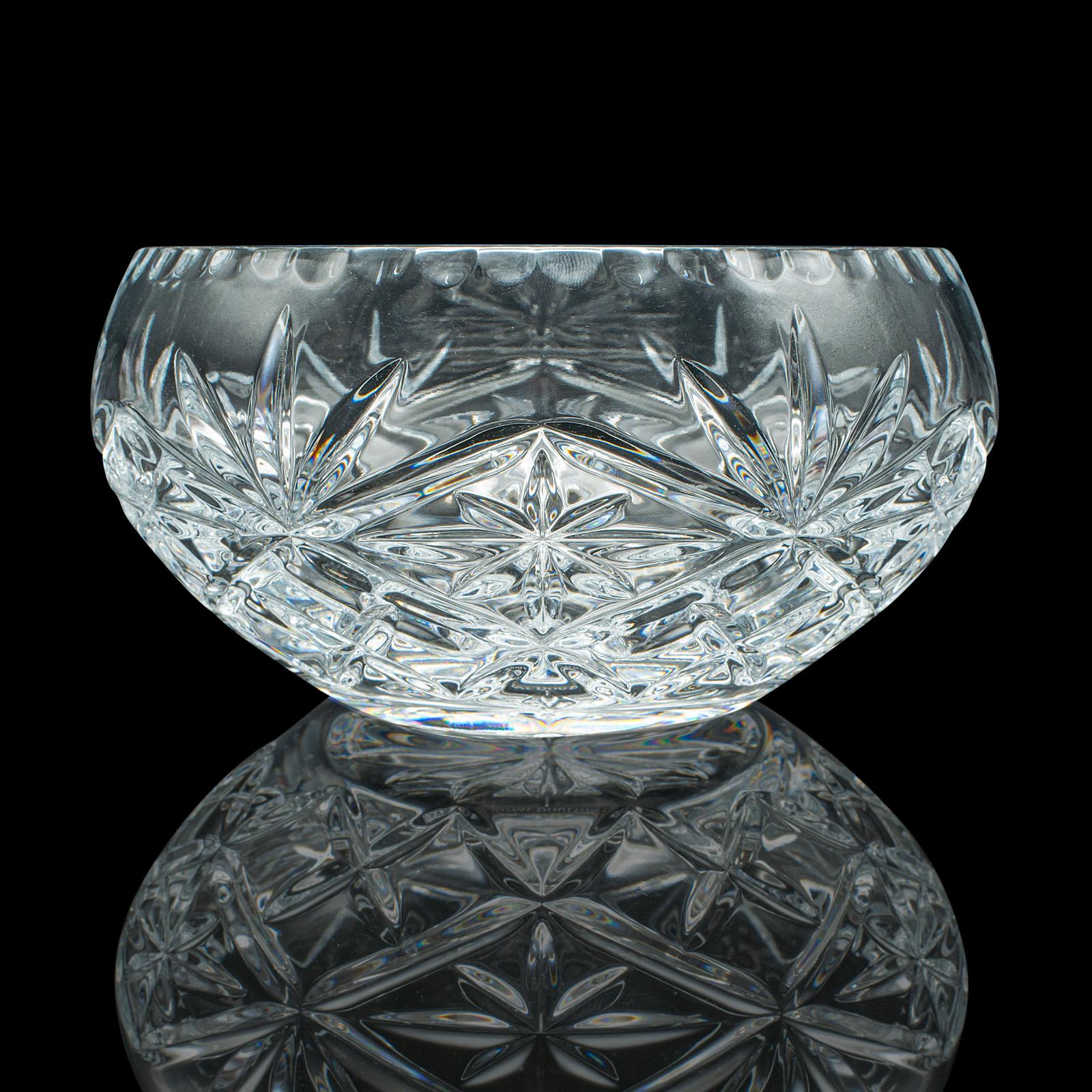 This is a vintage decorative fruit bowl. An English, cut crystal glass serving dish, dating to the late 20th century, circa 1990.

Appealingly decorative fruit bowl with a bright appearance
Displays a desirable aged patina and in good order
Quality