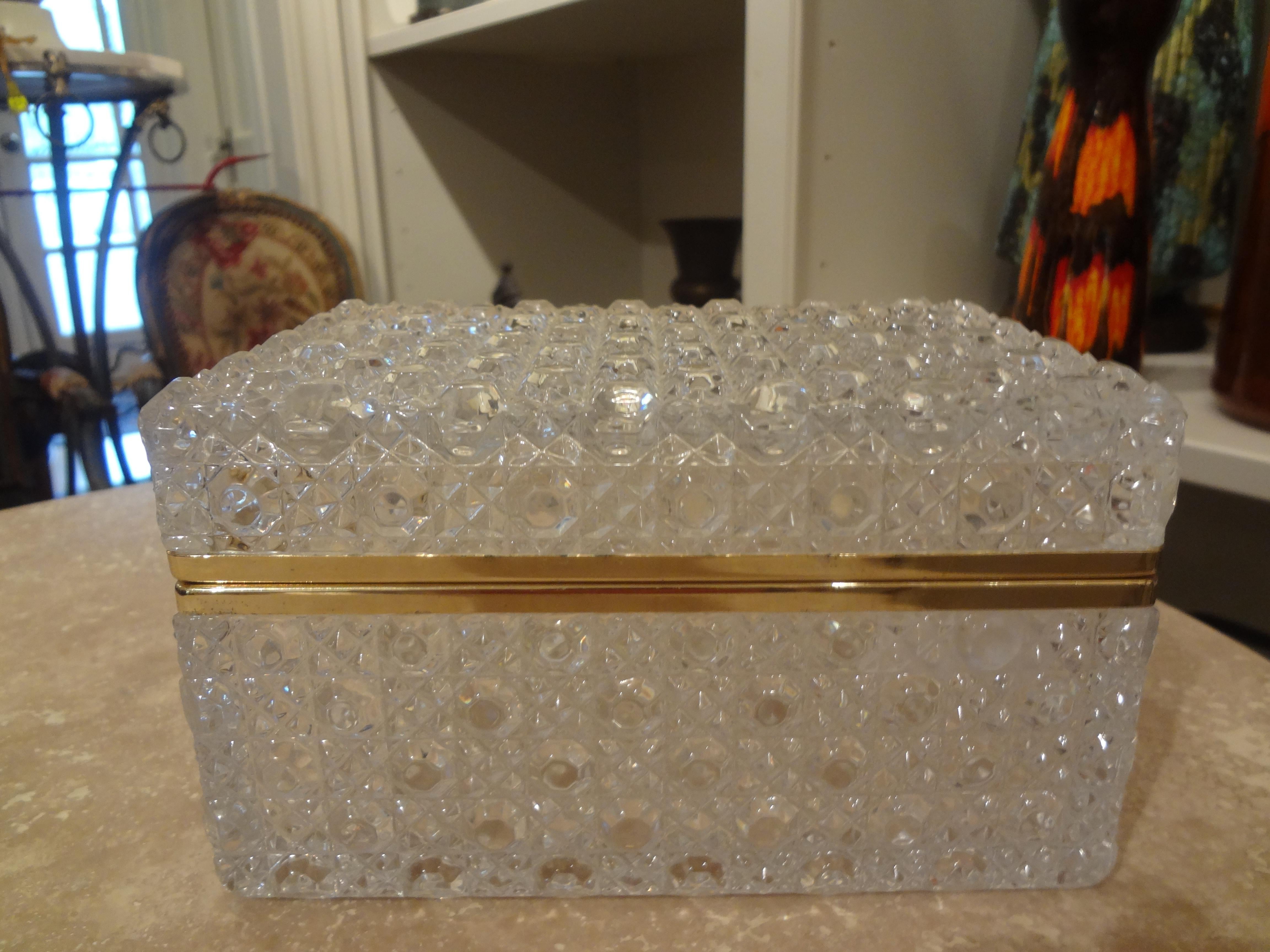 Vintage decorative glass box trimmed in brass. This beautiful glass box has a quilted design and makes a great coffee table accessory or jewelry box or jewel casket.
