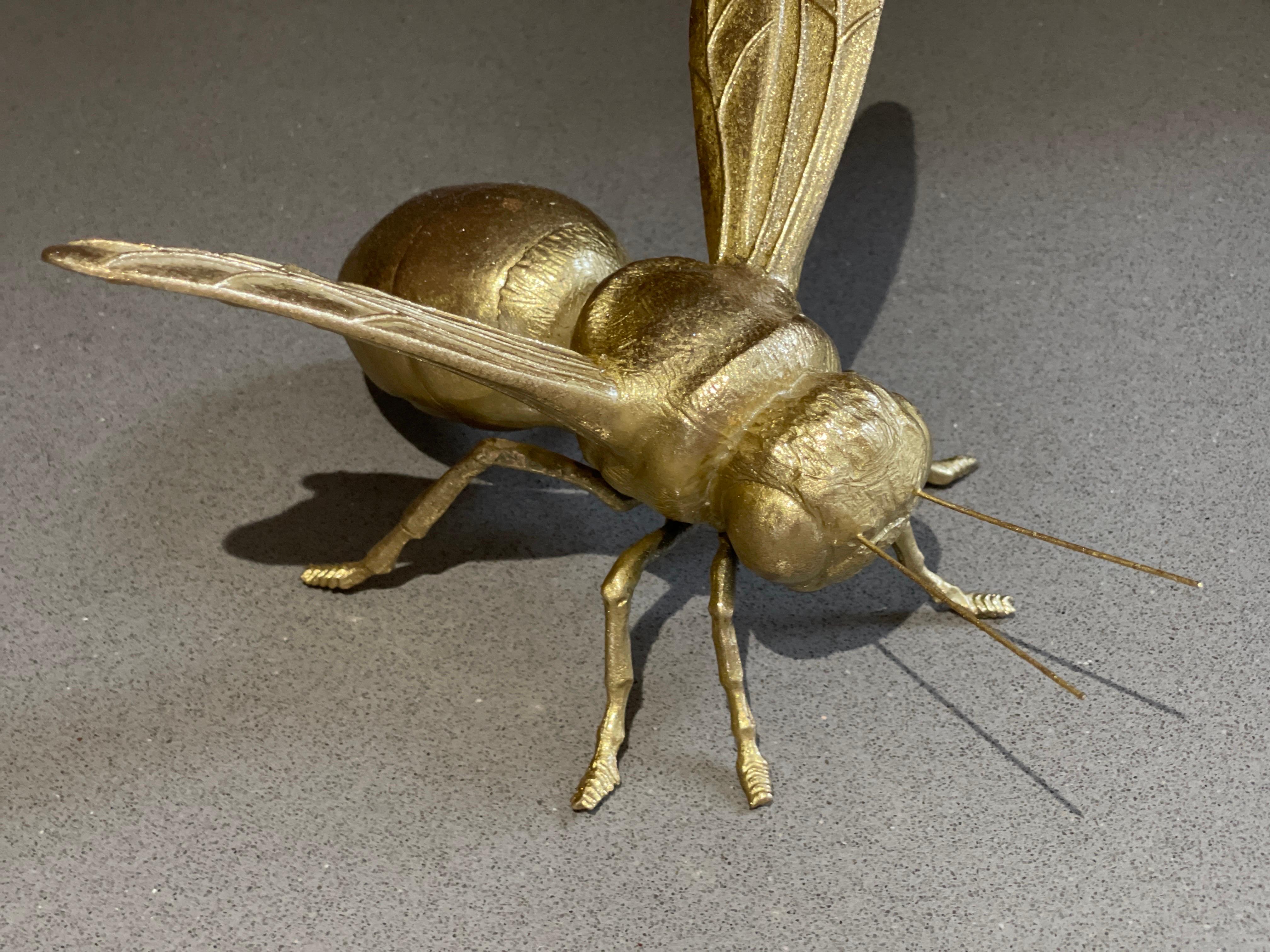 A beautiful vintage gold bee ornament for your room. An impressive size, this gold bee is a beautiful statement piece for a shelf or sideboard!
29 x 15 x 13cm 

