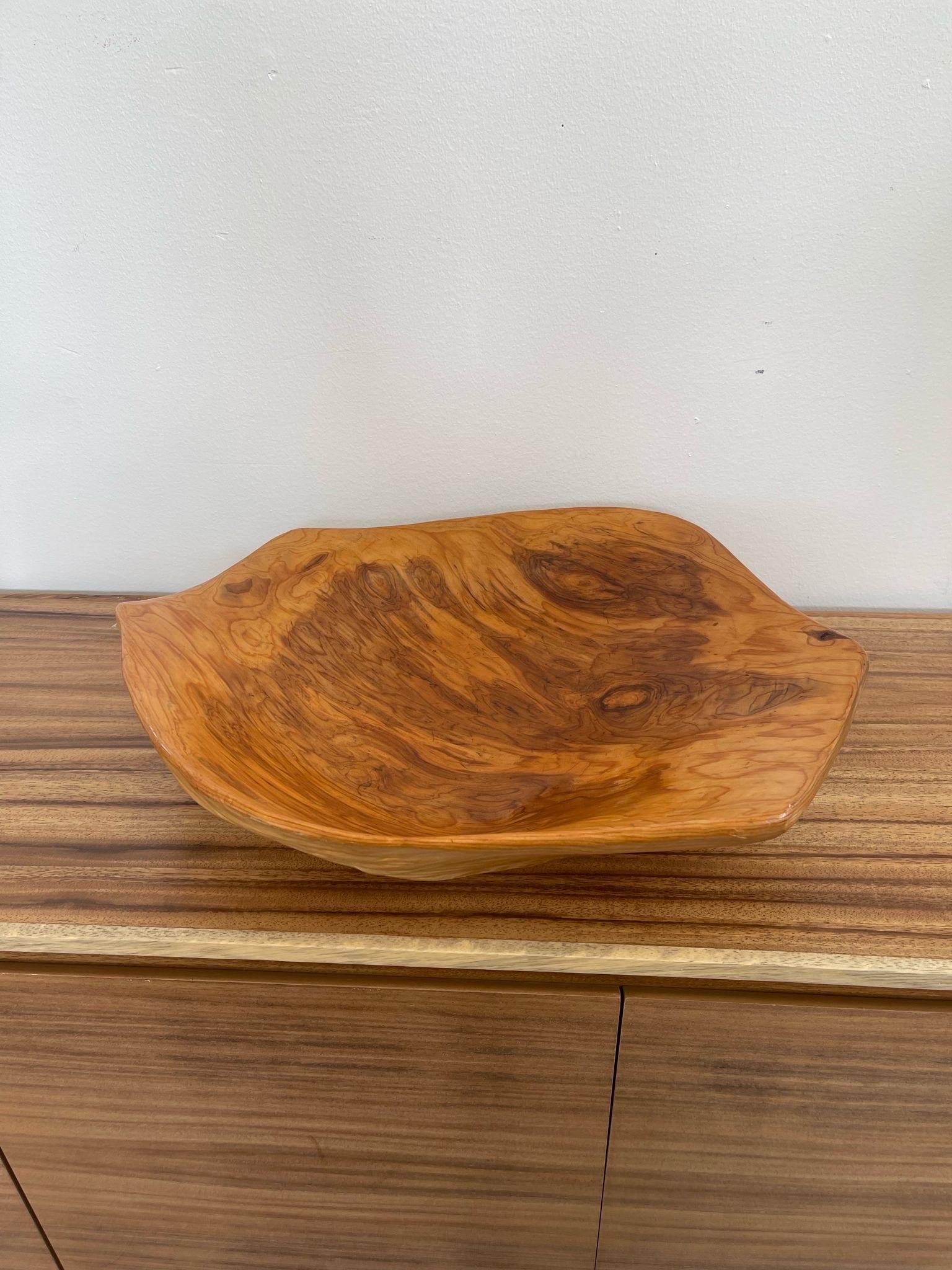 Made From Natural Wood with Organic Shape and Beautiful Wood Grain. Possibly Burl Wood. No Makers Mark. The Bottom Side of this Bowl has its Own interesting Shape and knotting. Vintage Condition Consistent with Age as Pictured.

Dimensions. 19 W ;