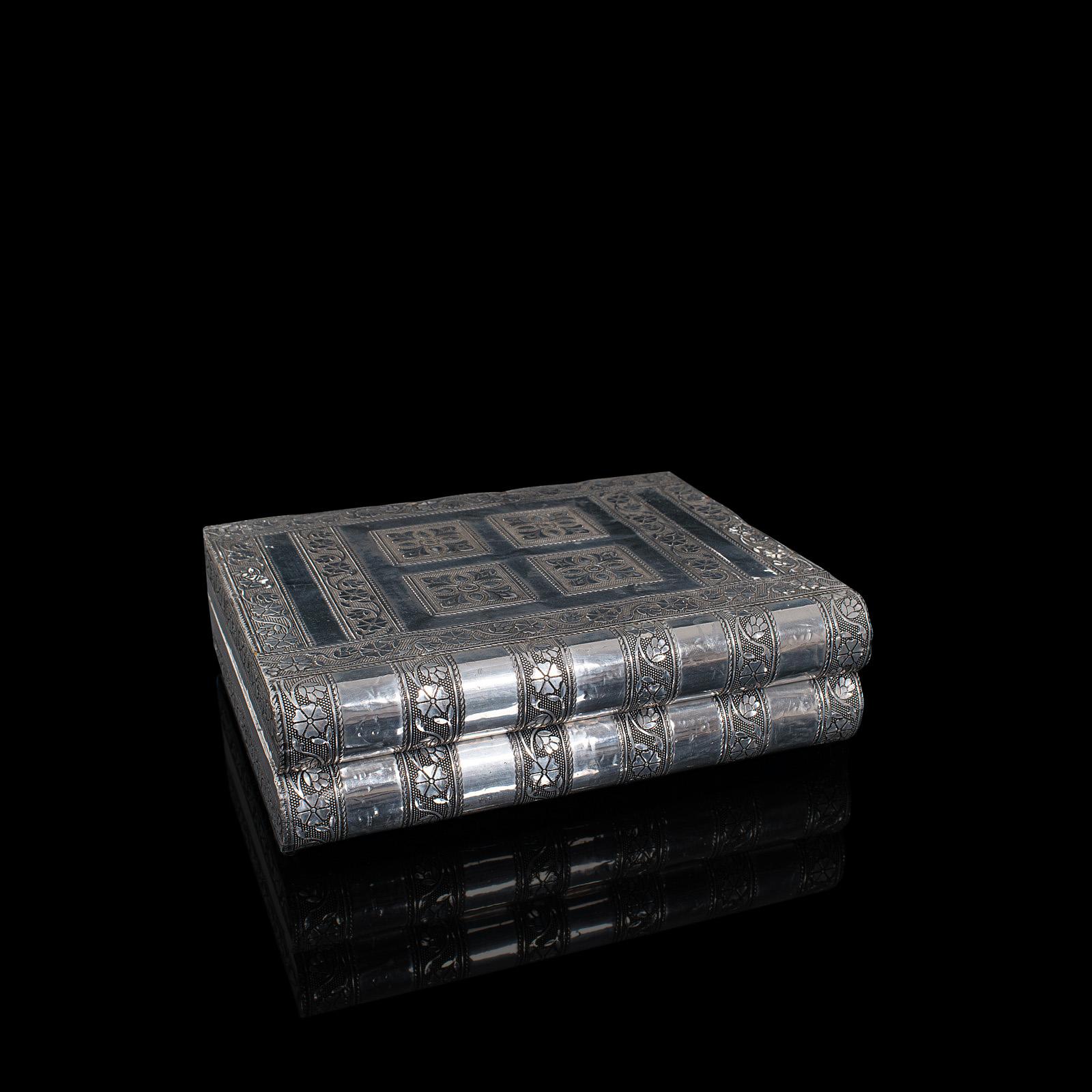 This is a vintage decorative jewelry box. An Indian silver vanity case, dating to the late 20th century, circa 1970.

Appealing jewelry box with vibrant interior
Displaying a desirable aged patina with light natural tarnish
Indian silver