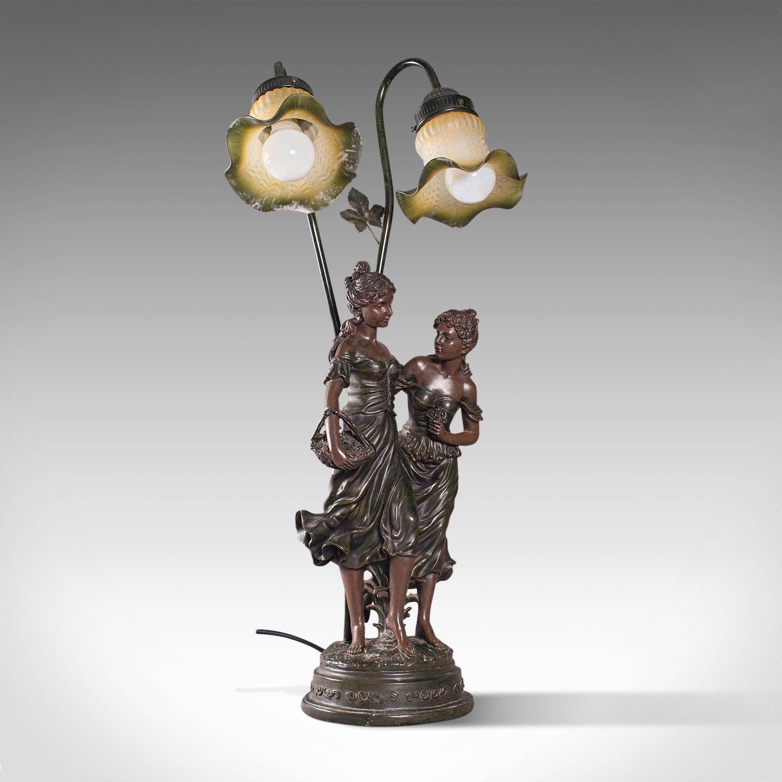 This is a tall, vintage decorative lamp. A French, spelter bronze figural table light in the form of two females, dating to the late 20th century, circa 1970. 

Characterful lamp with Art Nouveau overtones
Displaying a desirable aged patina