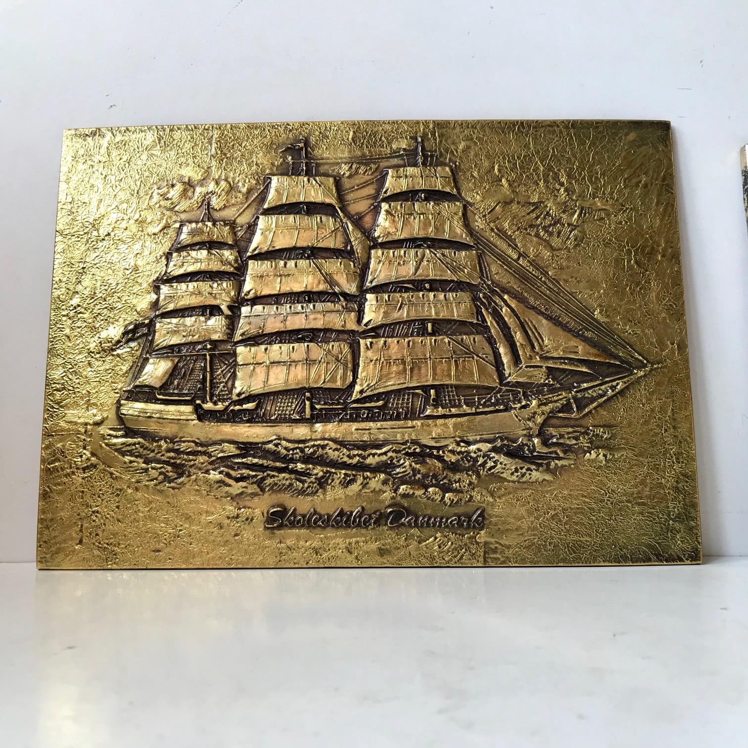 Rare decorative wall plaques for a nautical environment. A set of gilt wax/masonite plate images of the two historical Danish Full Rigged ships 'Skoleskibet Danmark' and 'Peder Most' built respectively in 1932 and 1944. Both of them made in Denmark