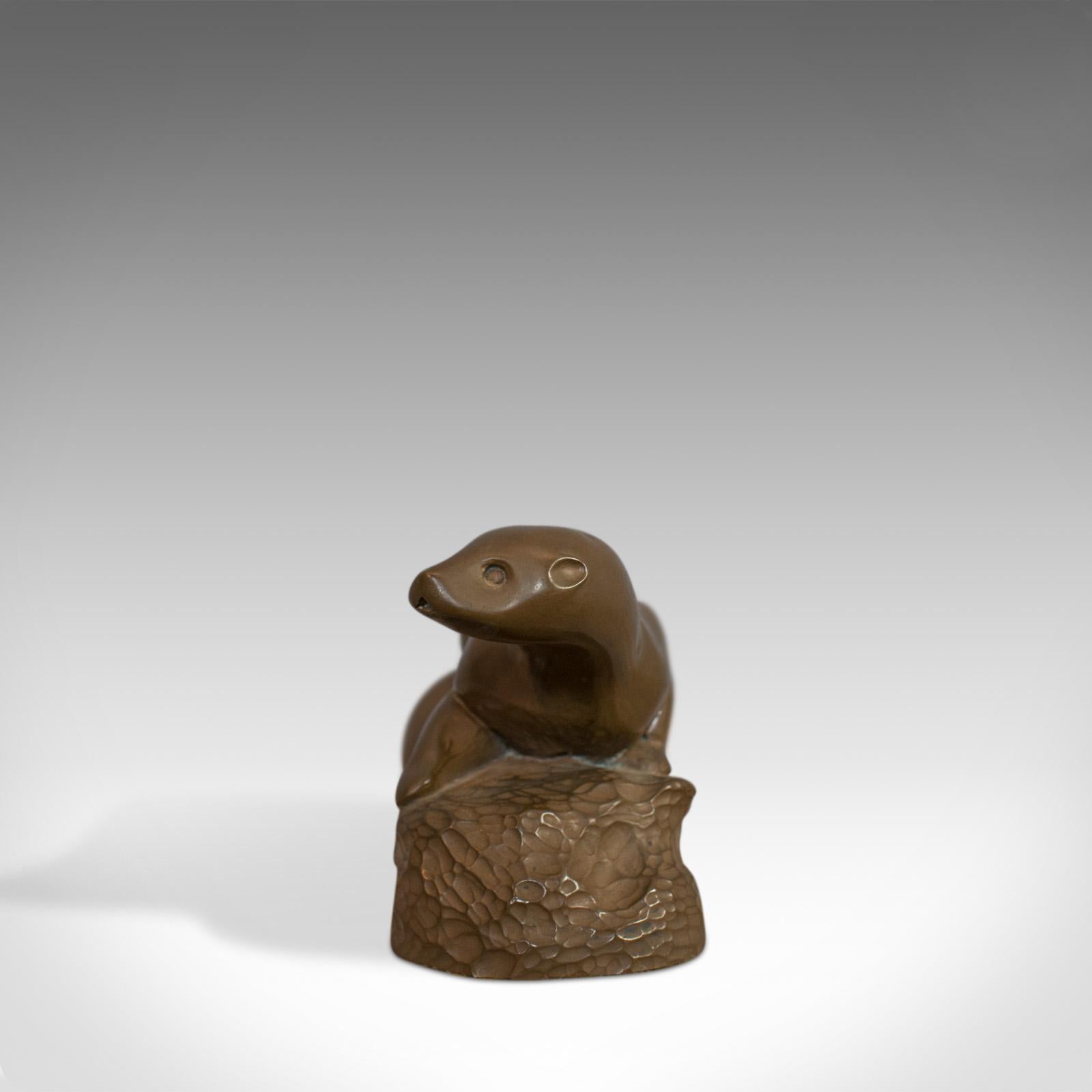 This is a vintage decorative otter. A French, bronze spelter Art Deco ornament dating to the mid-20th century, circa 1940.

Good consistent hues throughout and displaying a desirable aged patina
Generous weight and proportions
Lithe form showing