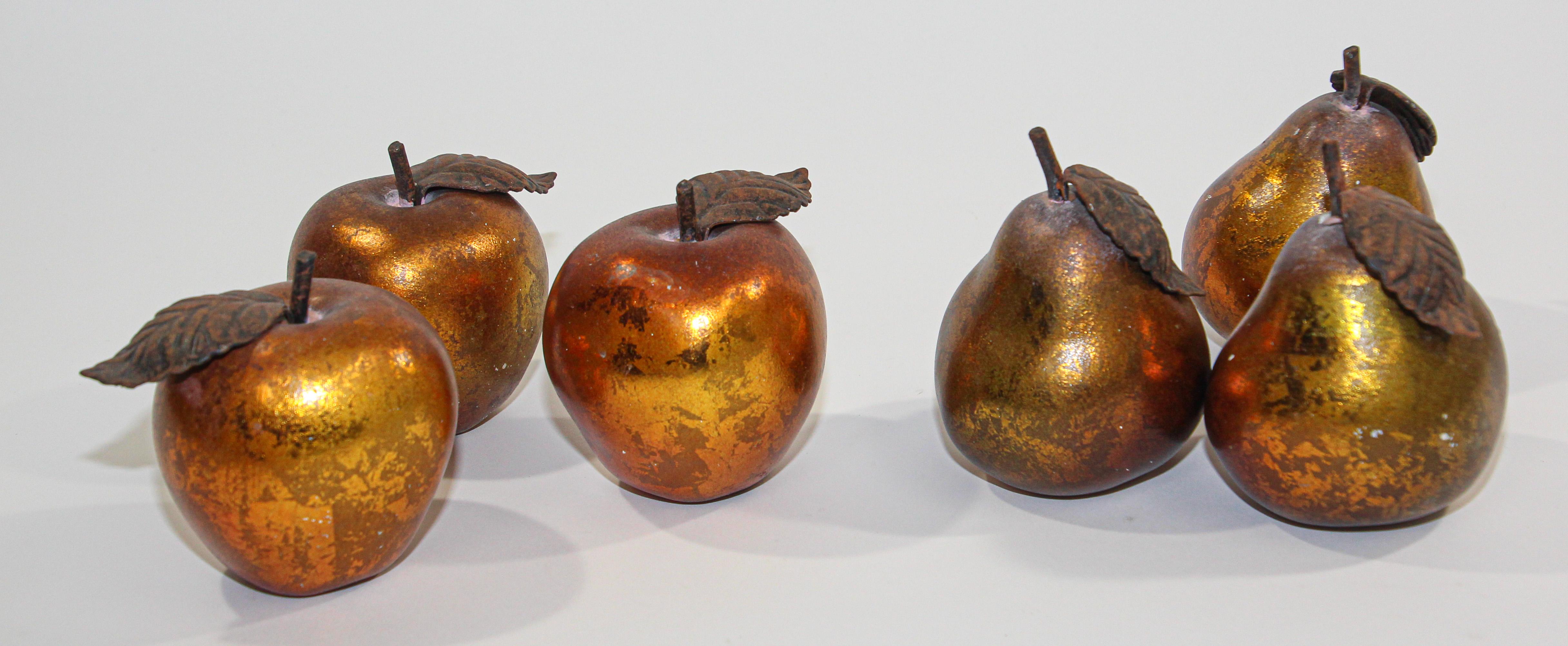 Vintage gilt metal pears and apples with faux oxidation and distress look. 
They are hollow, not heavy and they have a gold gilt like finish with a great patina.
Great for fall mantel decoration or shelf decor. 
Set of 3 pears and 3 apples.
Each