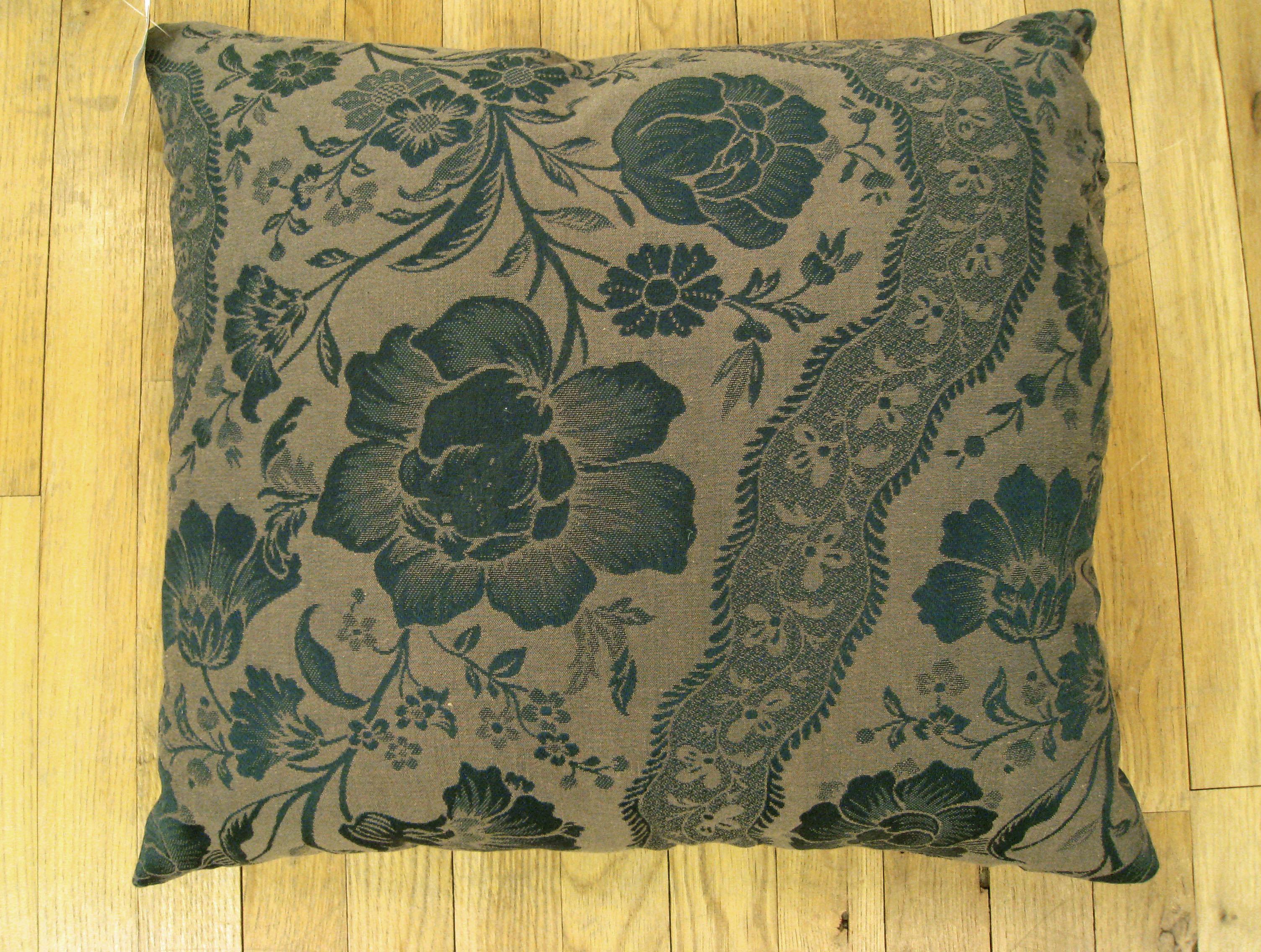 A vintage decorative pillow with a directional floral pattern, size 22