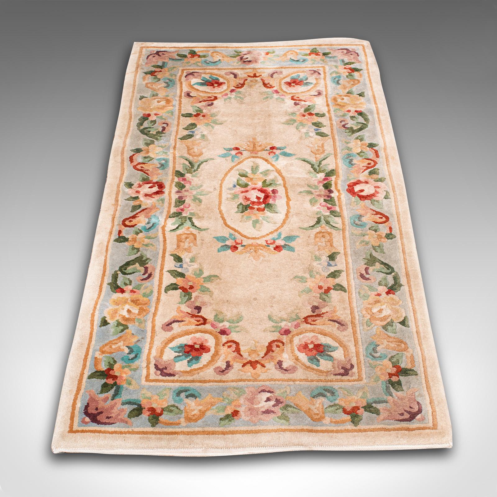 This is a vintage decorative rug. An Oriental, quality woven hallway carpet, dating to the late 20th century, circa 1970.

Generously sized for the doorway at 78.5cm x 154cm (31