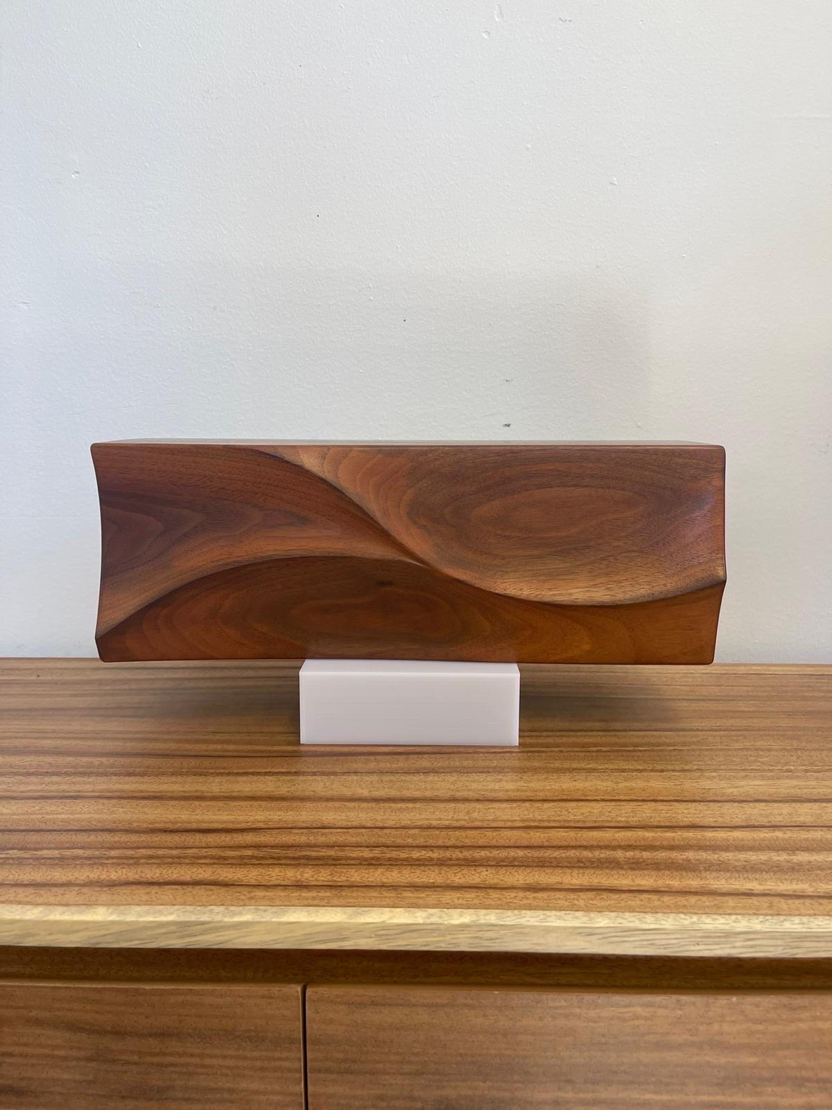 Carved wood decorative piece can be used as a floating shelf unit or organic decor. Beautiful Wood Grain with sleek design. Signed by the marker as shown. Vintage Condition Consistent with Age as Pictured.

Dimensions. 17 W ; 6 D ; 5 H