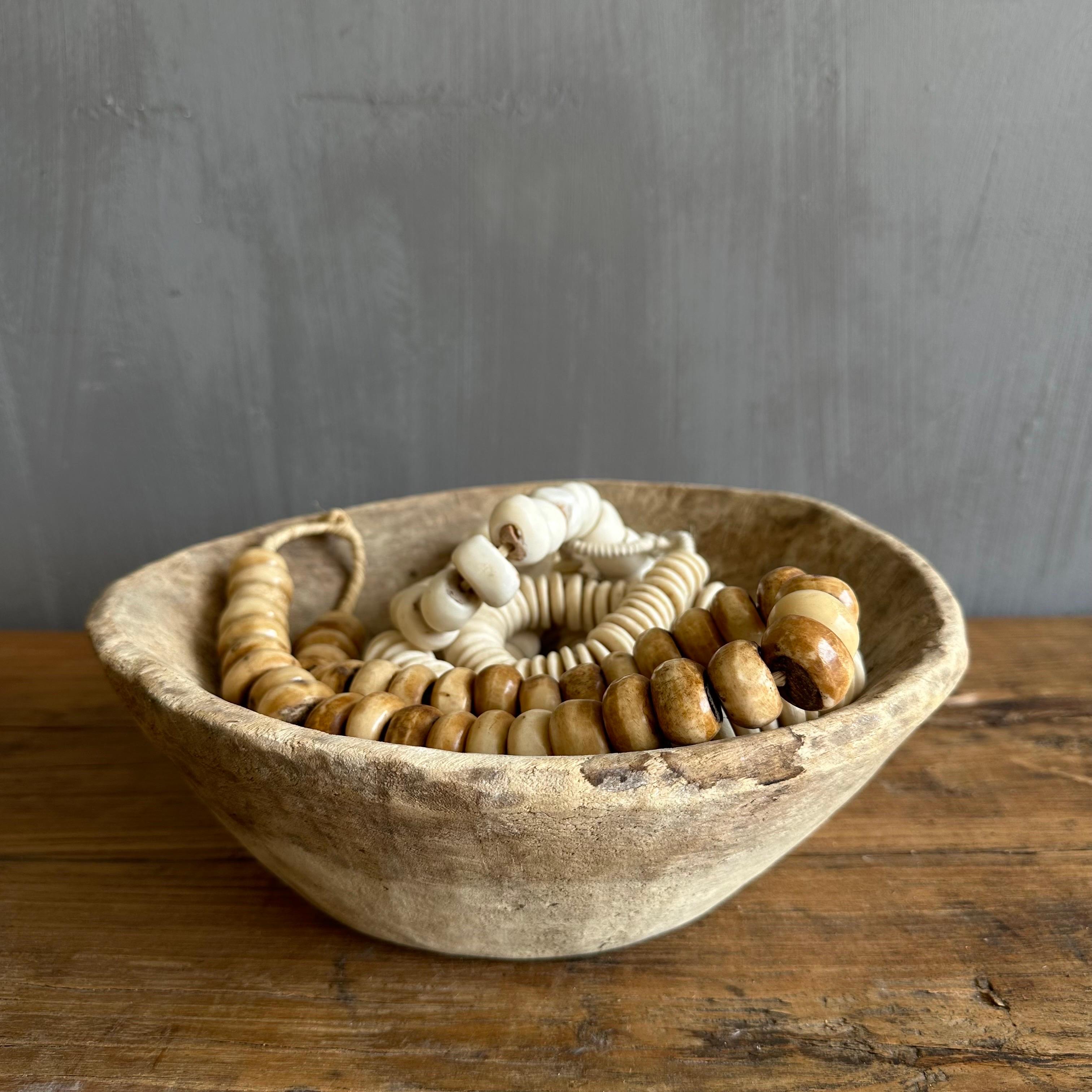 Large vintage decorative bowl. Use for countertops, or as and accent on a wall. Light weight, unfinished wood. Accessories not included. Size: 12” x 11” x4”.