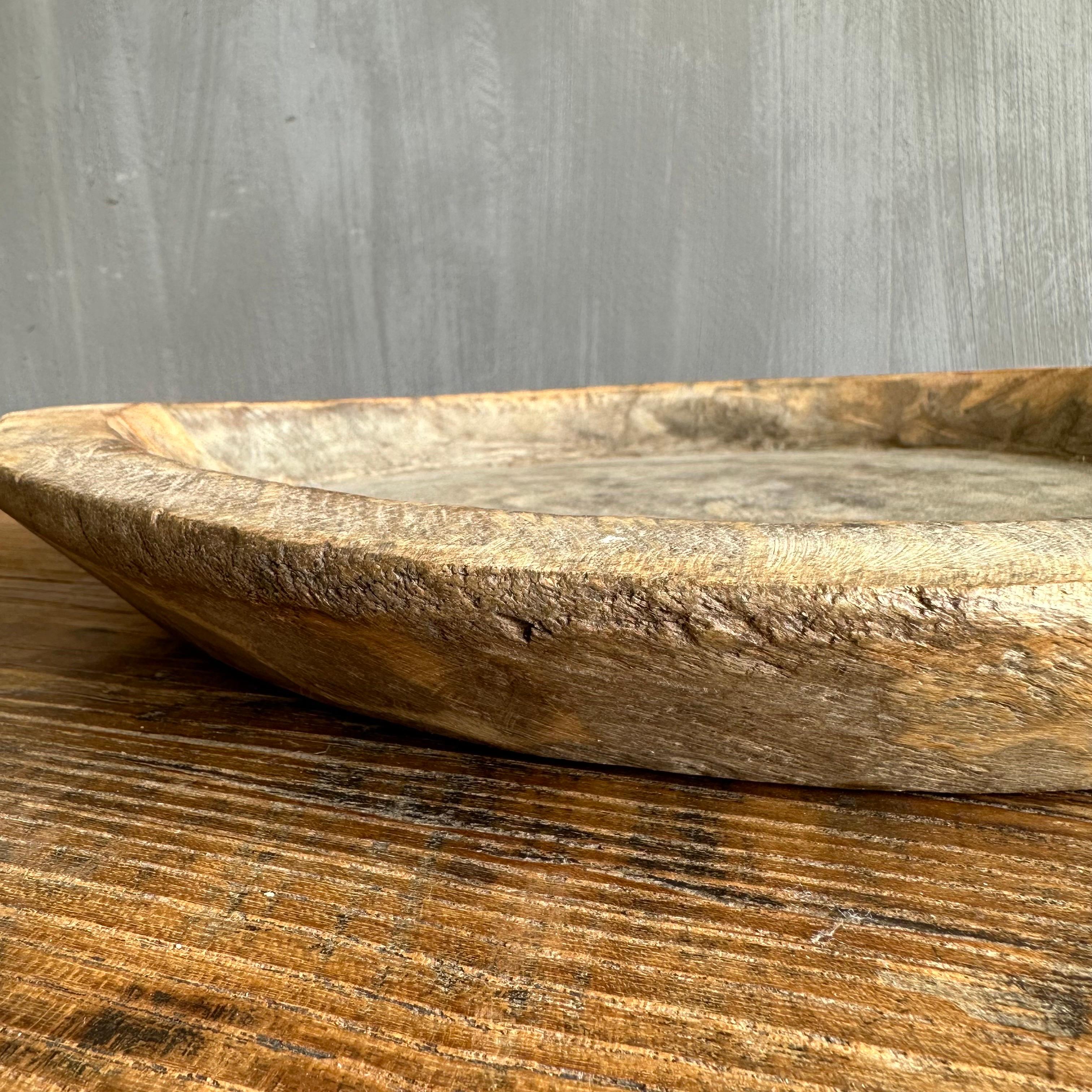 Large vintage decorative bowl. Use for countertops, or as and accent on a wall. Light weight, unfinished wood. Accessories not included. Size: 15” x 14.5” x 2.25”.