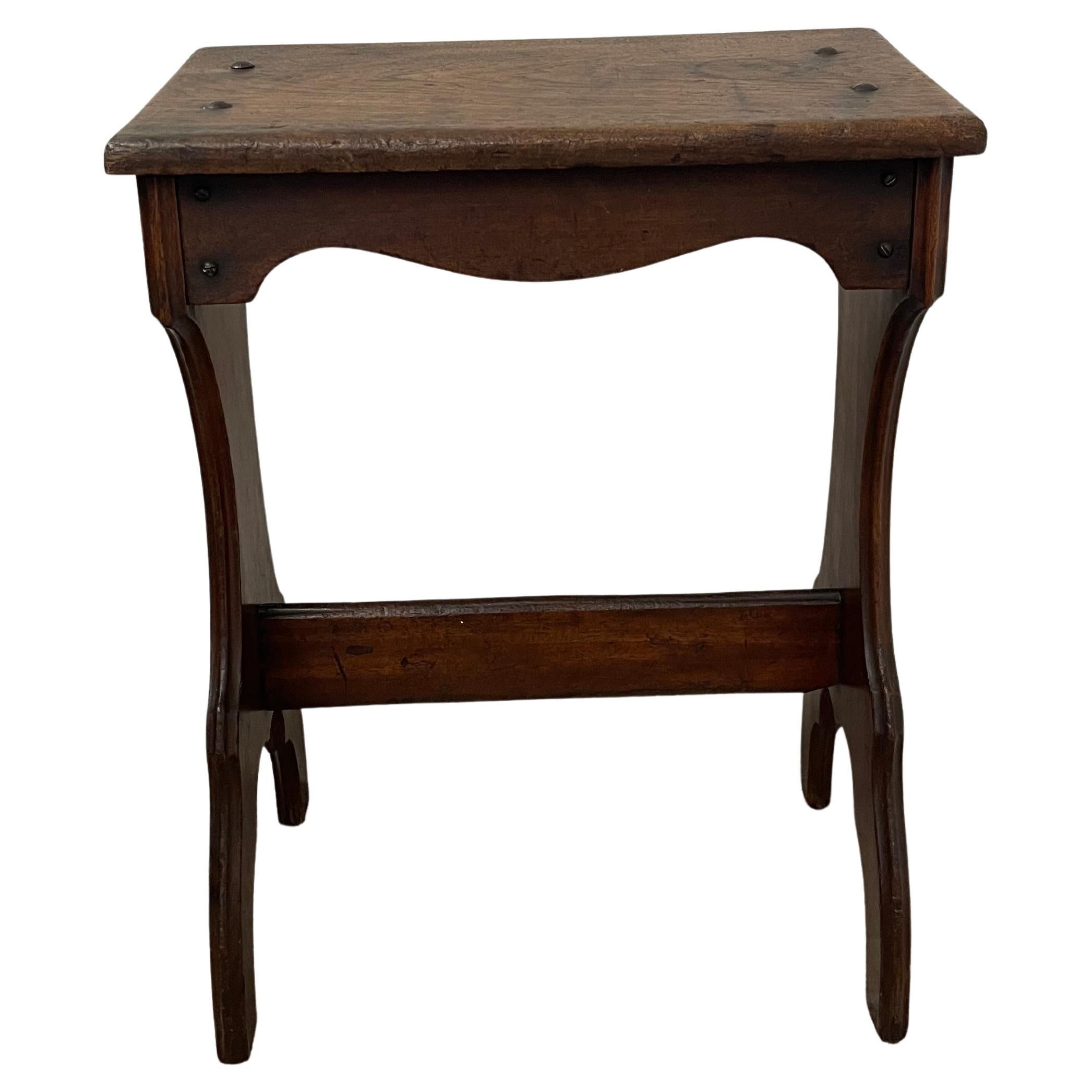 Vintage Decorative Wood Stool with Curved Silhouette and Exposed Peg Details