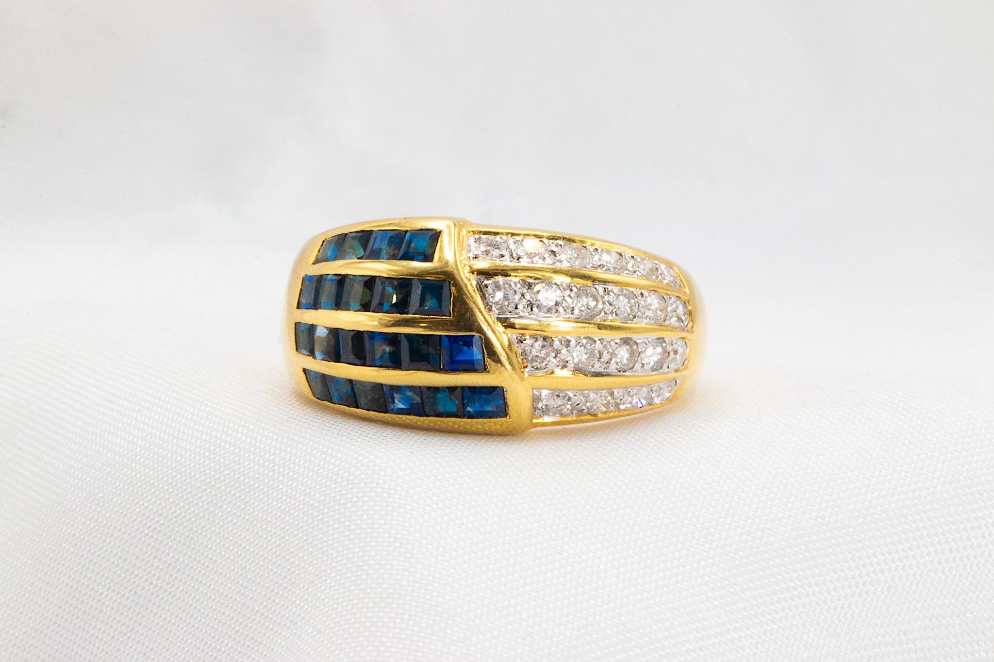 This 18K yellow gold band is a mouth-watering display of color. Weighing 7.1 grams with approximately 0.65 carat in natural square-cut sapphires and an additional 0.25ct of round diamonds, E-F color, VS2-SI1 clarity. The four rows on this domed band