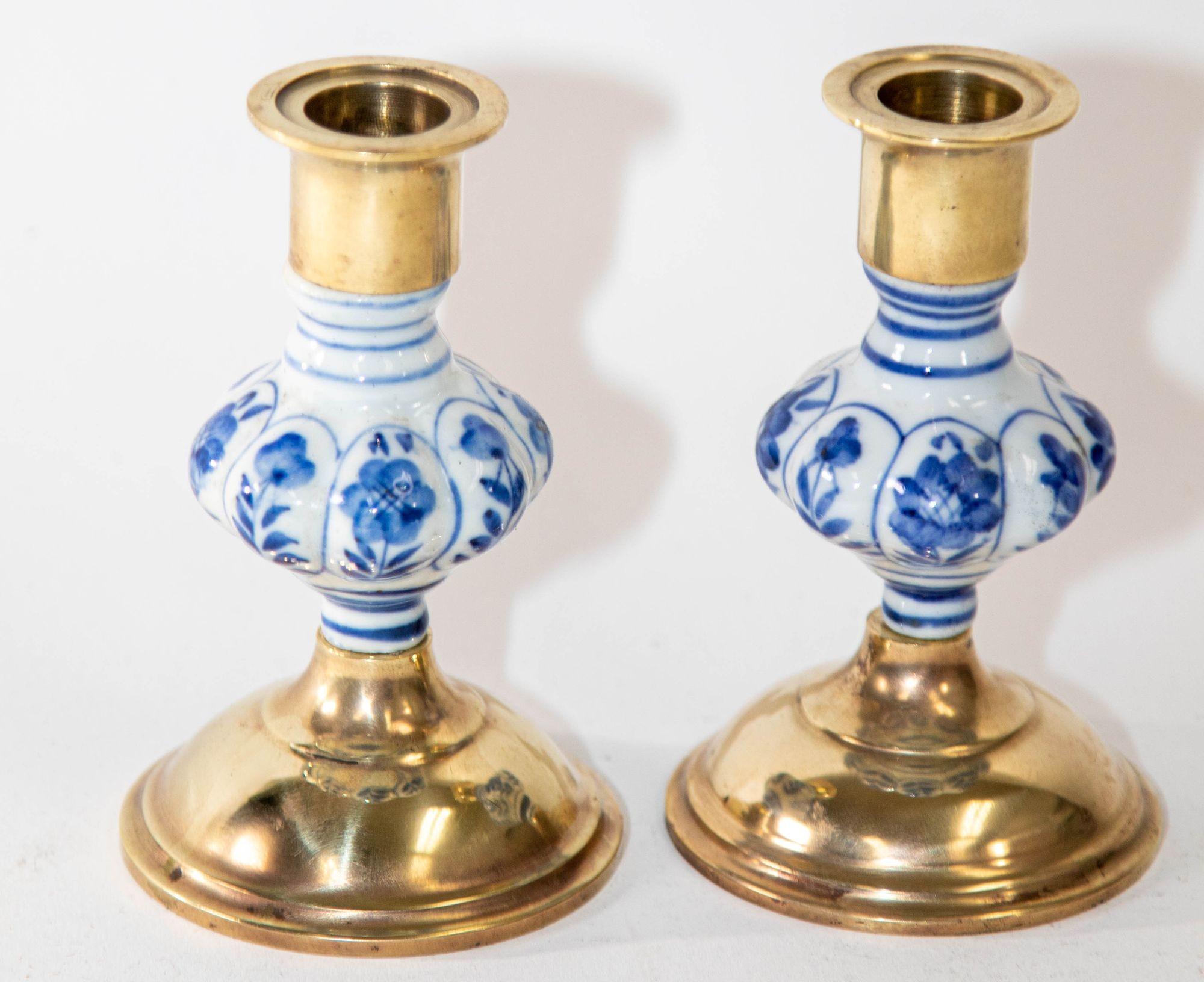 Dutch Vintage Delft Floral Blue and White Ceramic and Brass Candlesticks, a Pair 1950s For Sale