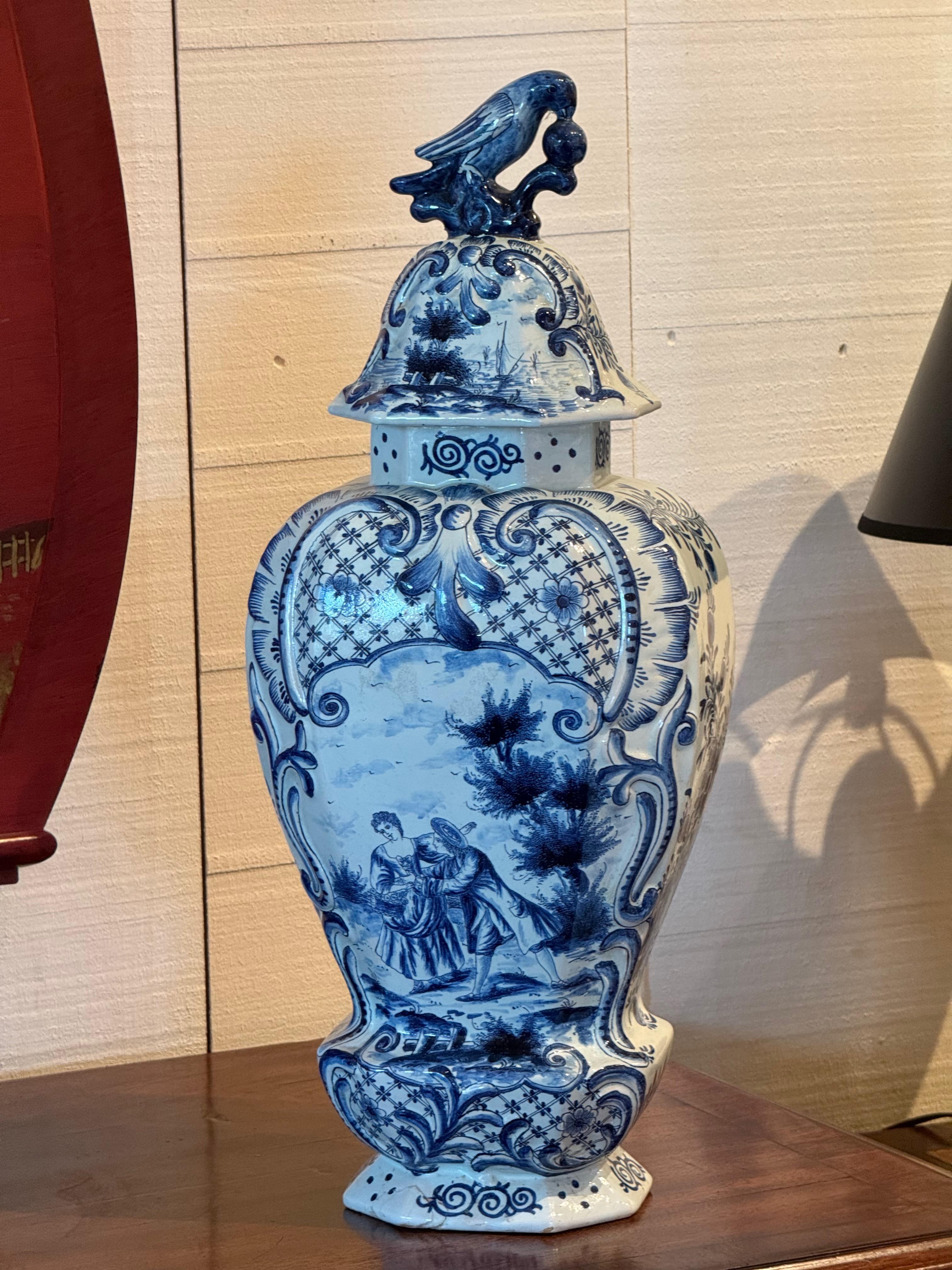 Dutch Vintage Delft Urn With Figural Scene and Bird Finial For Sale