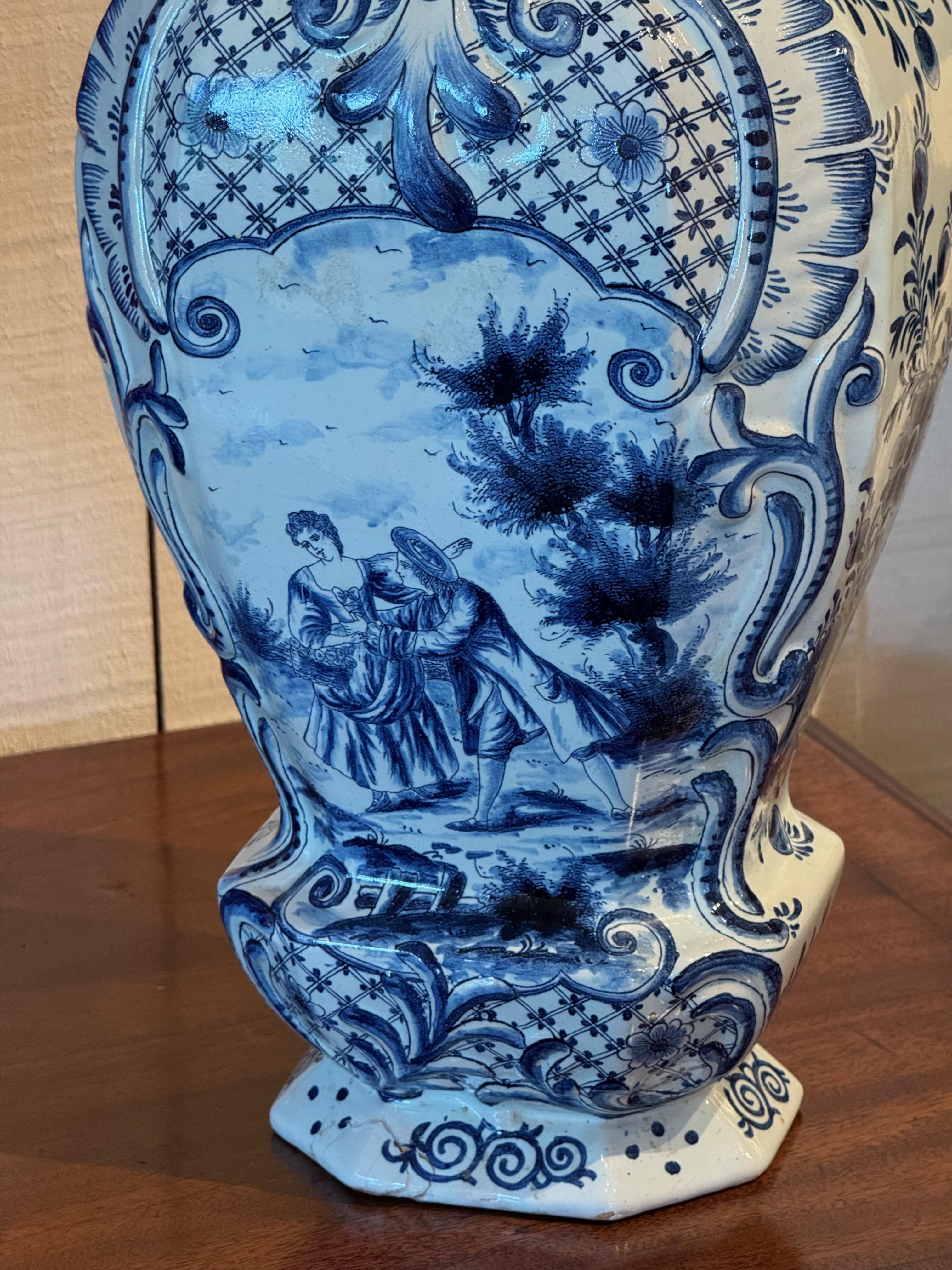 Mid-20th Century Vintage Delft Urn With Figural Scene and Bird Finial For Sale