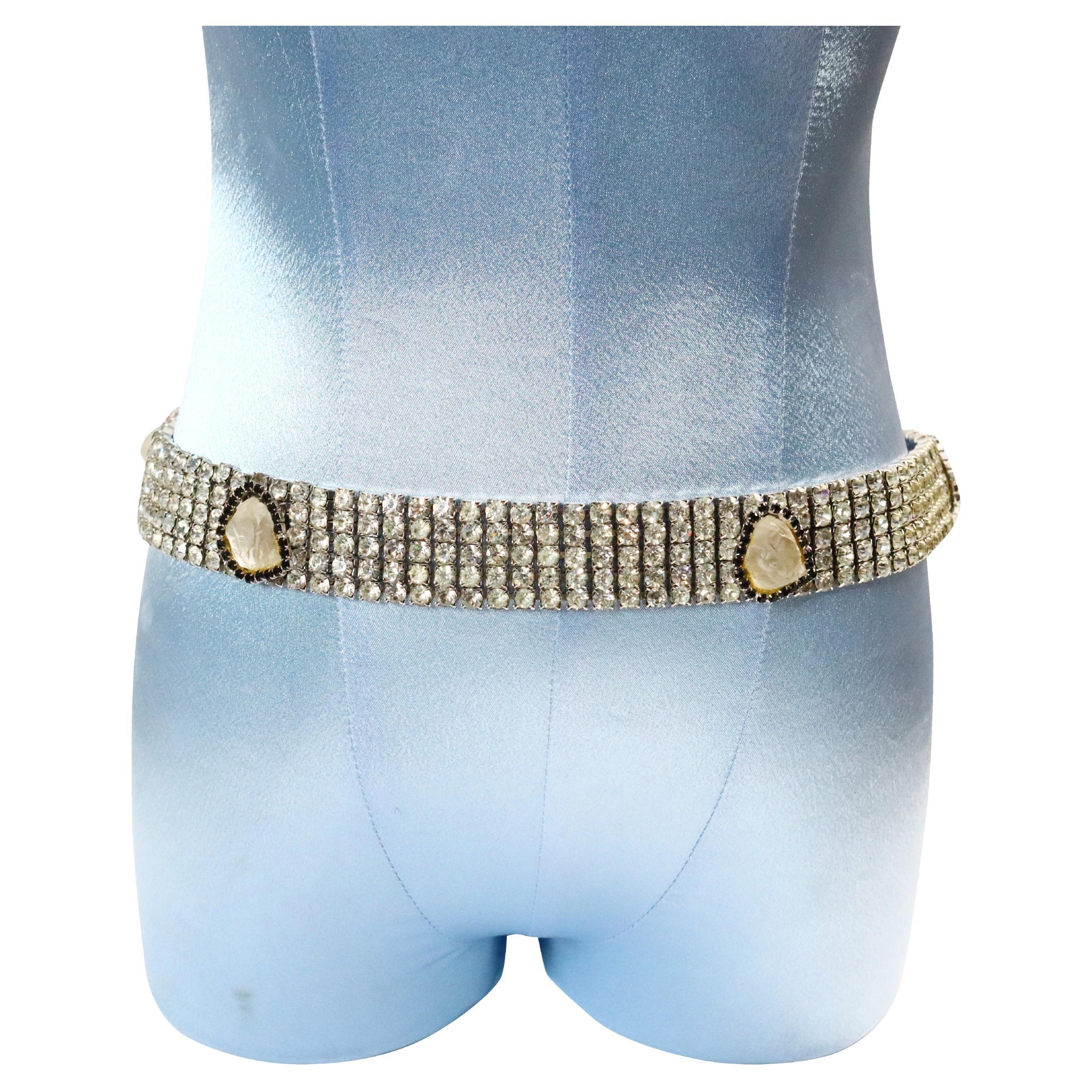 Vintage delillo belt with quartz-like pieces surrounded by Black Crystals, Circa 1970s.  This is perfection at its peak.  There are five rows of hand-set crystals with six pieces placed on the belt of quartz-like milky colors, surrounded by black