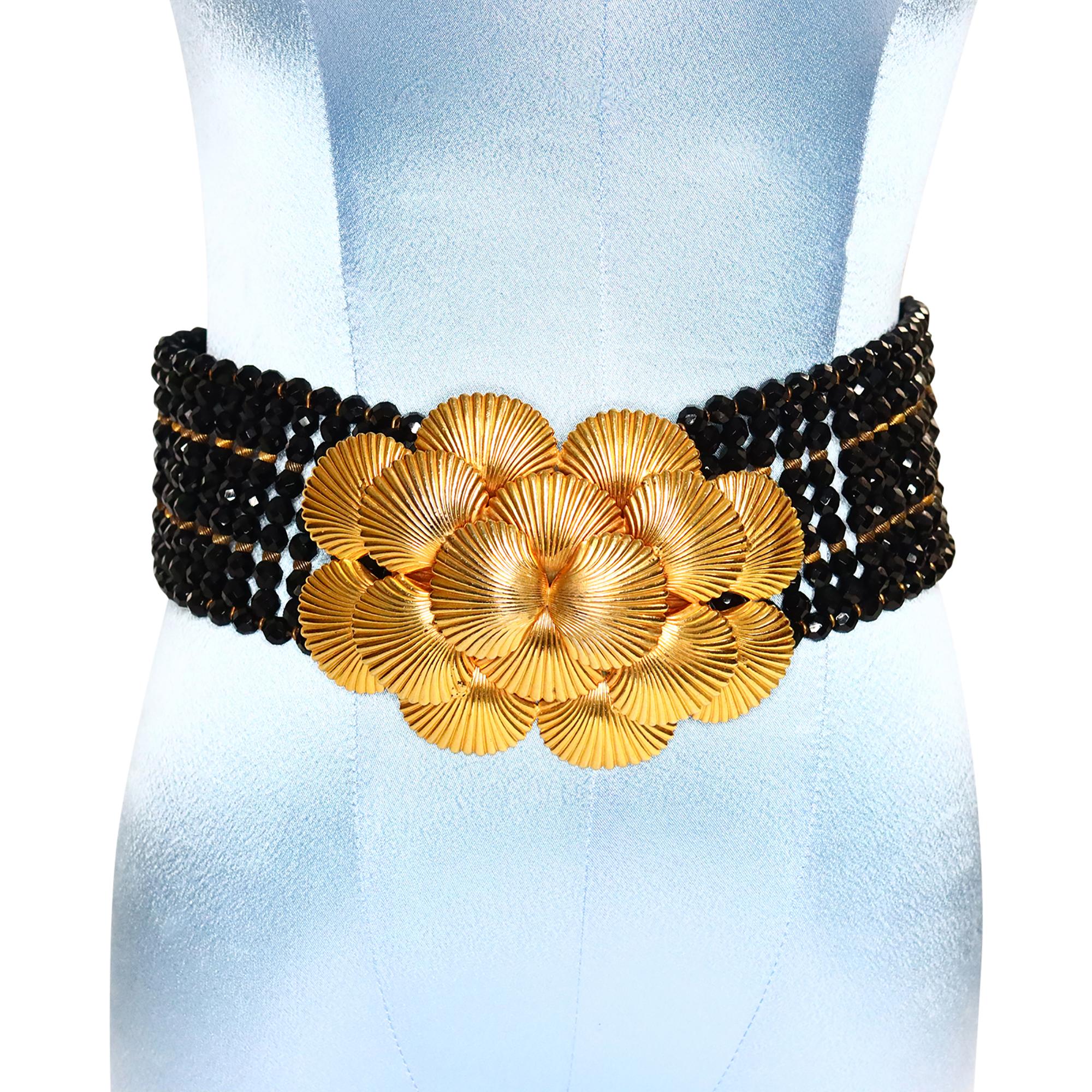 Vintage deLillo Black Beaded Belt with Gold Layered Buckle Circa 1970s. The black beads have gold beads interspersed. The deLilo belts I have are so gorgeous. This one is round and features gold beads as an offset color. The beauty is the wide,