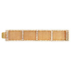Pulsera vintage Delillo de malla de oro con cristales, circa años 70