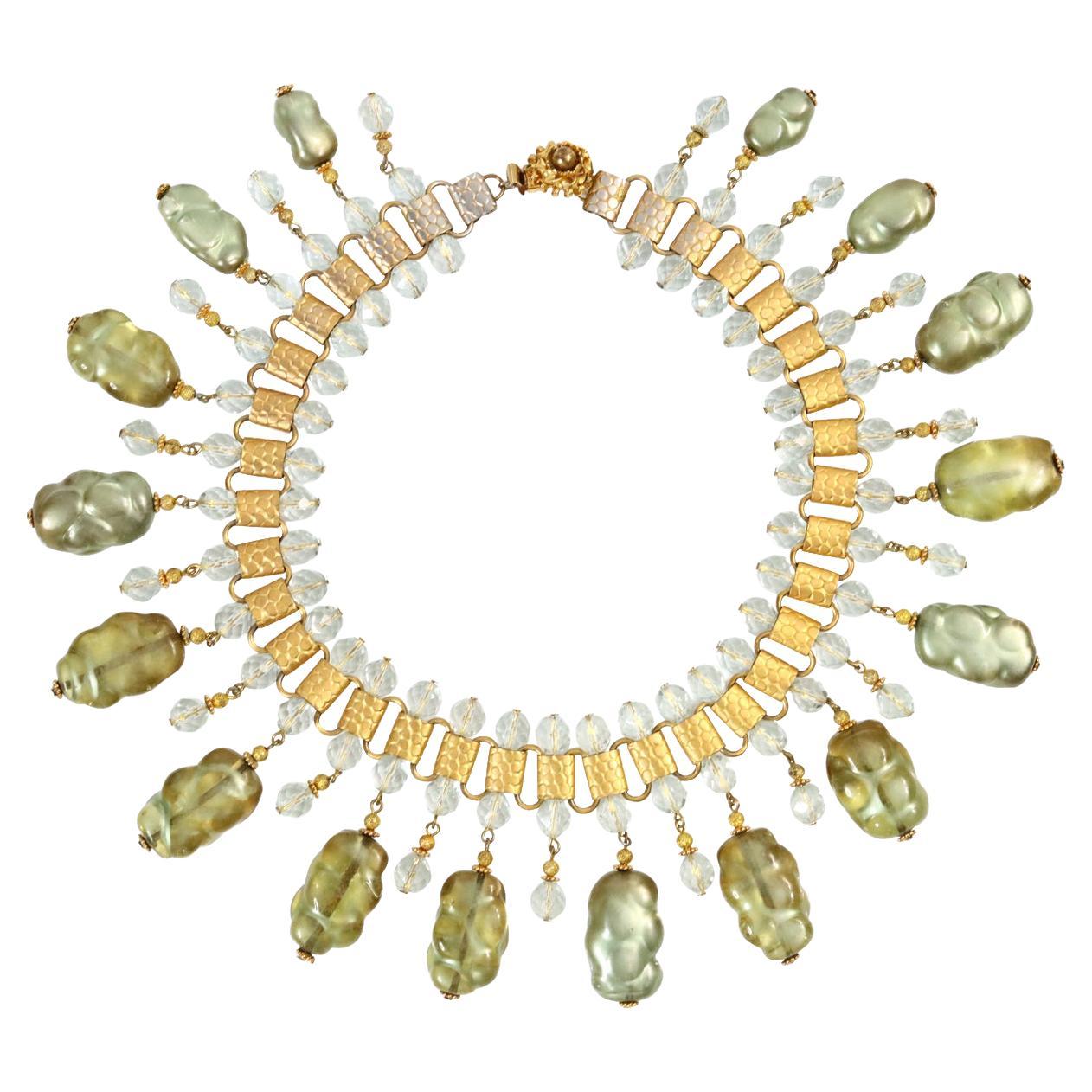 Vintage deLillo Gold Tone with Light Green Dangling Beads Necklace Circa 1970's.  This is so special.  The bigger beads are a mottled light green citrine with a gold piece to finish at the bottom.  There is a lighter bead in between each large bead