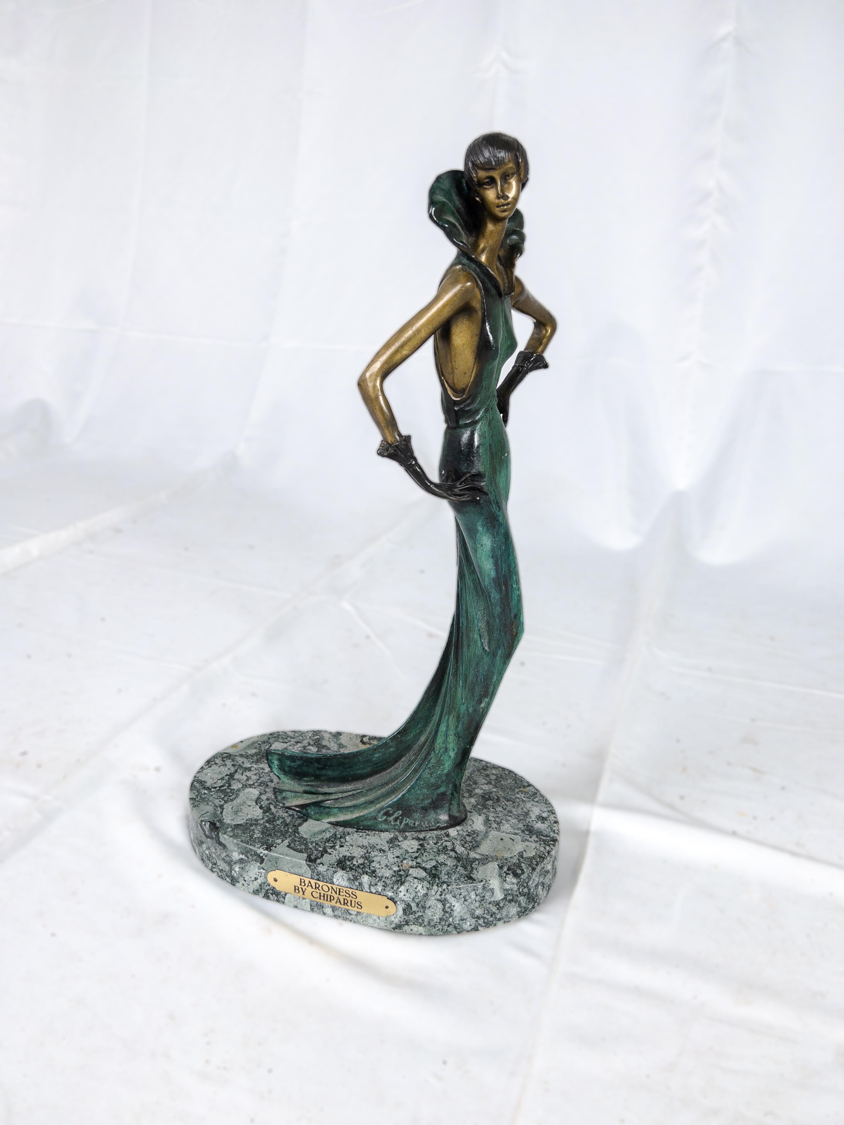 Vintage Demetre Chiparus Baroness Art Deco bronze sculpture.

Vintage Art Deco bronze figural sculpture of a socialite with hood and beautiful draped period clothing by Chiparus called 