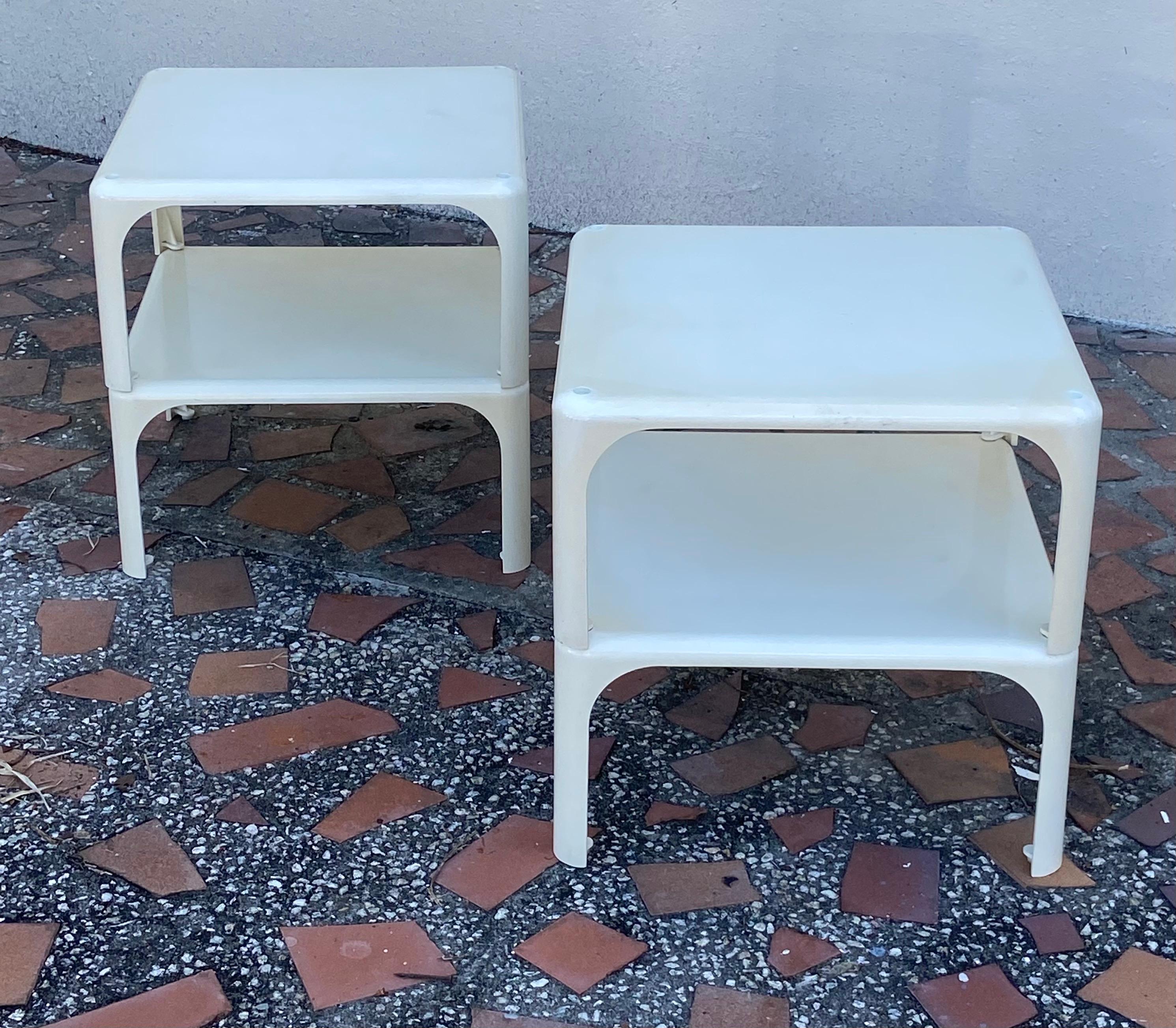   Demetrio 45 stackable side table in white plastic, designed by Vico Magistretti for Artemide in the 1960s. Four stacking side tables can be used as sofa tables nightstands, or small coffee tables. 