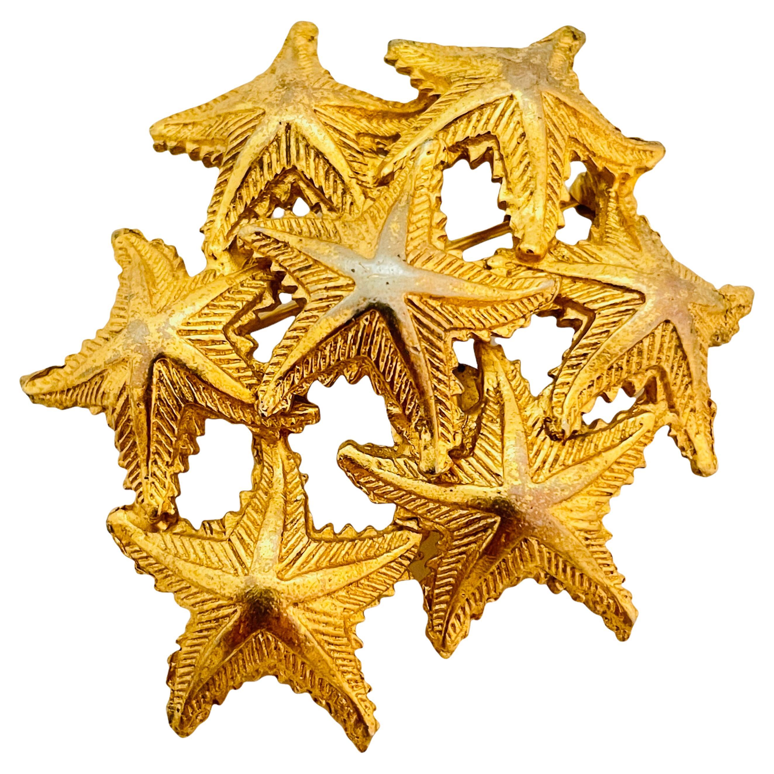 Vintage DENICOLA gold tone star brooch designer runway For Sale