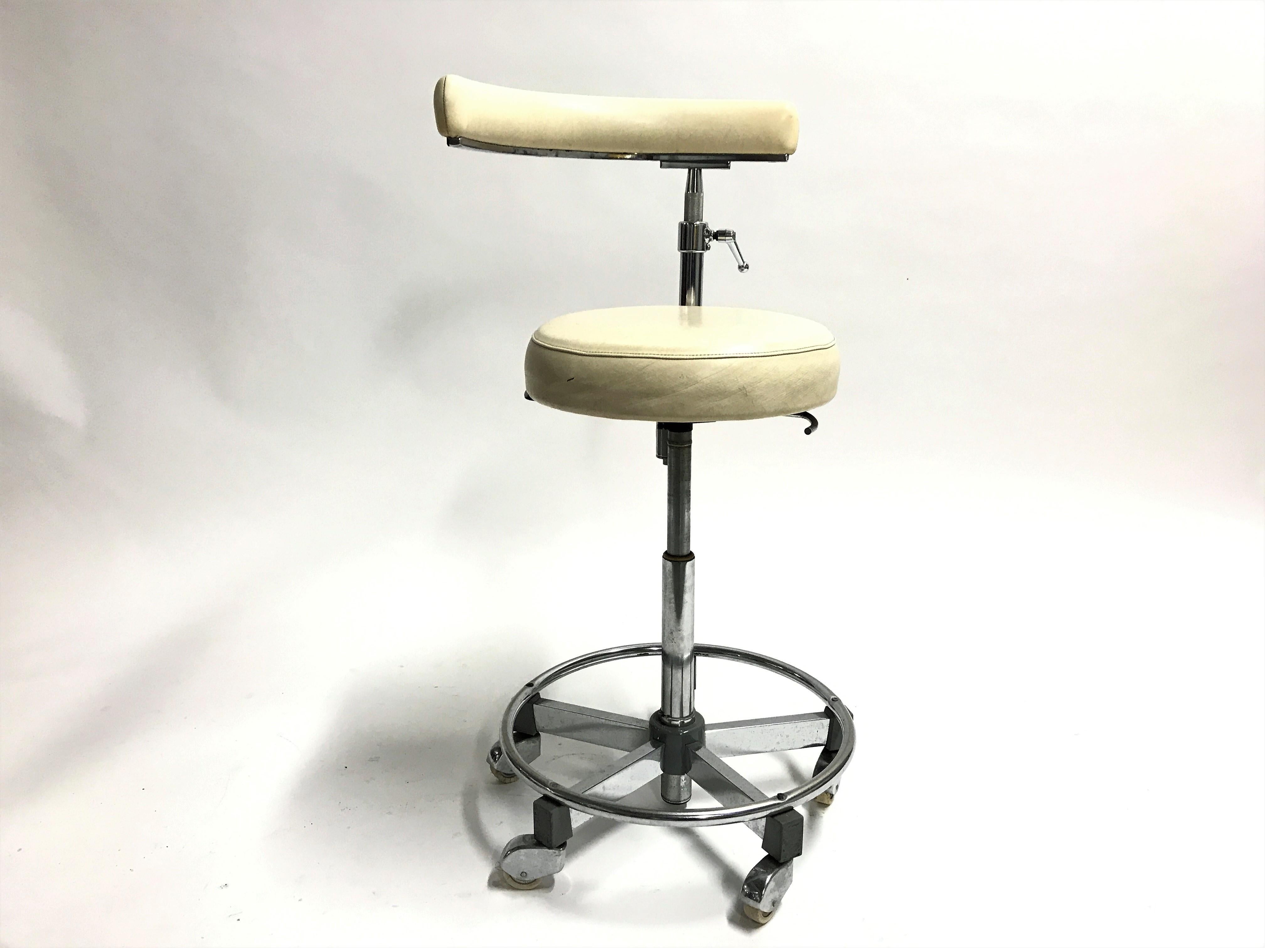 Vintage dentist chair made from chromed steel and skai.

This chair has wheels, is adjustable in height and the backrest is adjustable as well.

1970s, Germany

Height: 94cm/37”
Seat height from 47cm/18.5” to 66cm/26”
Diameter: 44cm/17”.

 