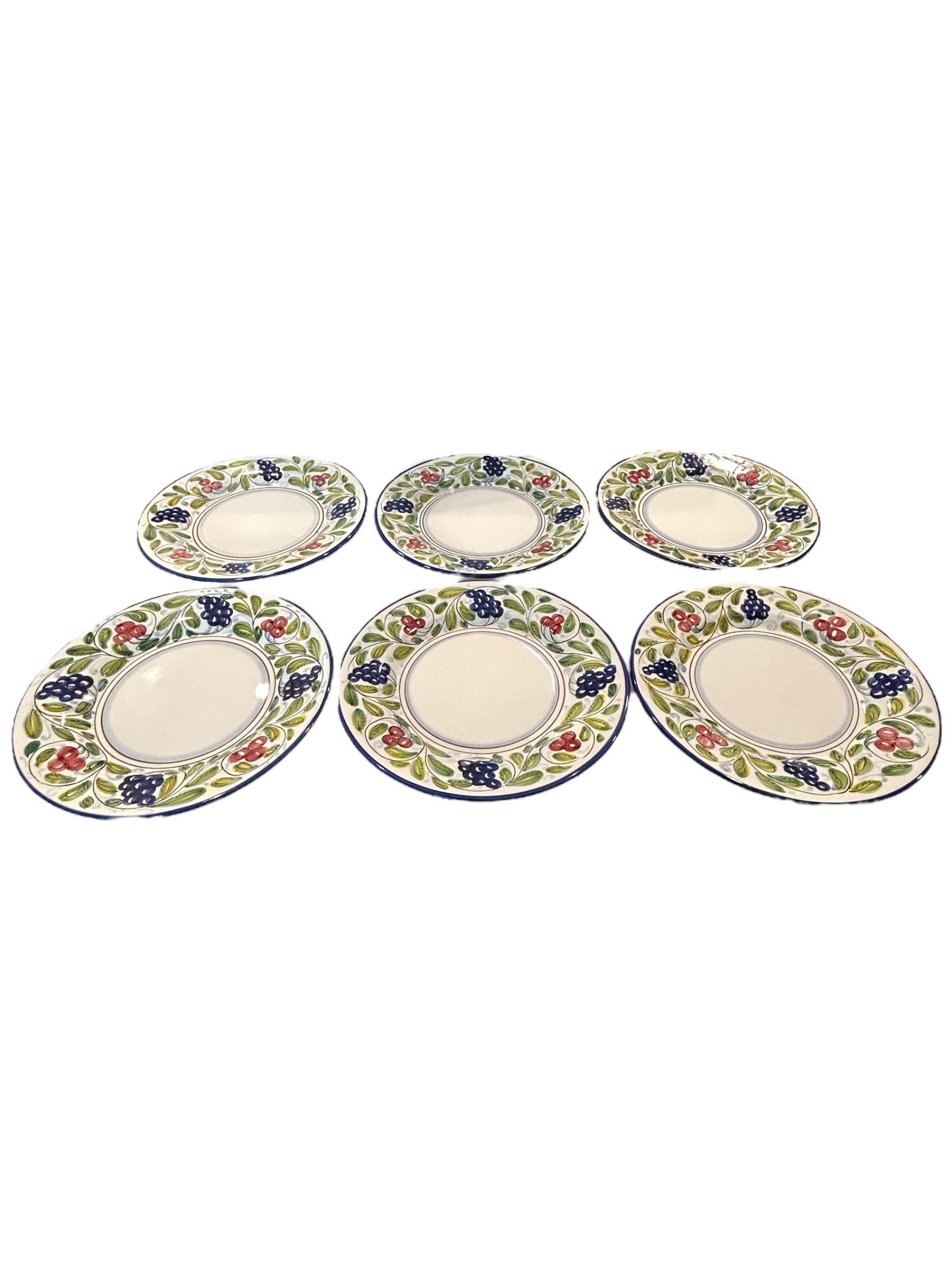 Excellent condition~no chips, cracks or crazing! This whimsical design of grapes and cherries with blue trim salad/dessert plates will make a wonderful addition to any table decor!

8.75”dia.