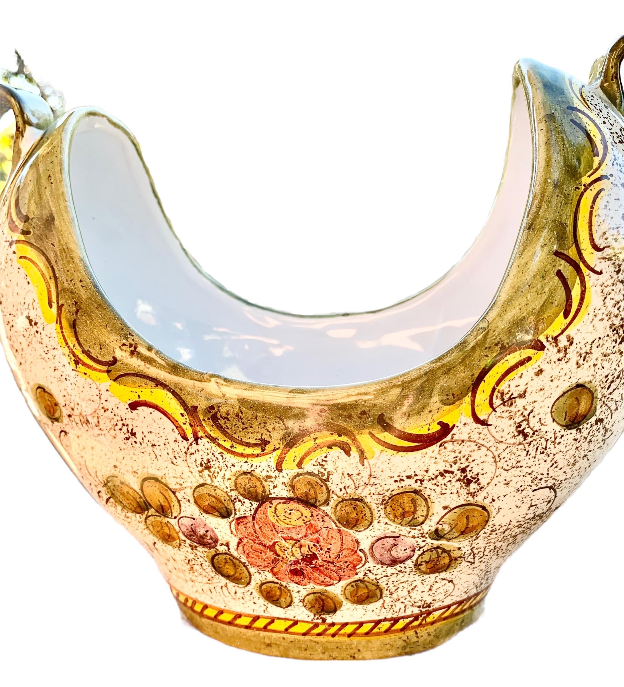 A unique, rare early 20th century Italian Majolica boat shaped bowl created in the Deruta studio, Deruta, Italy. A rare and coveted example of the golden age of Italian Majolica,