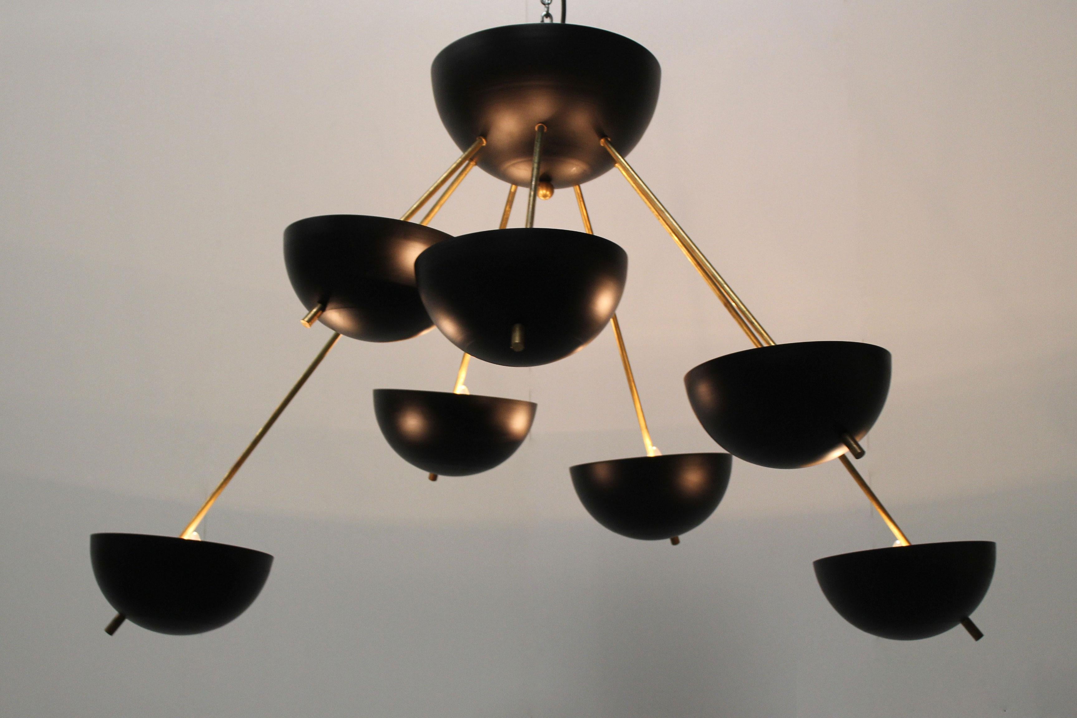 Magnificent midcentury design Sputnik chandelier attributed to Stilnovo, circa 1958
It has a wonderful minimalistic Stilnovo attributed design with lines inspired by the Space Age.
The chandelier has seven sockets and is fully rewired. Brass shows