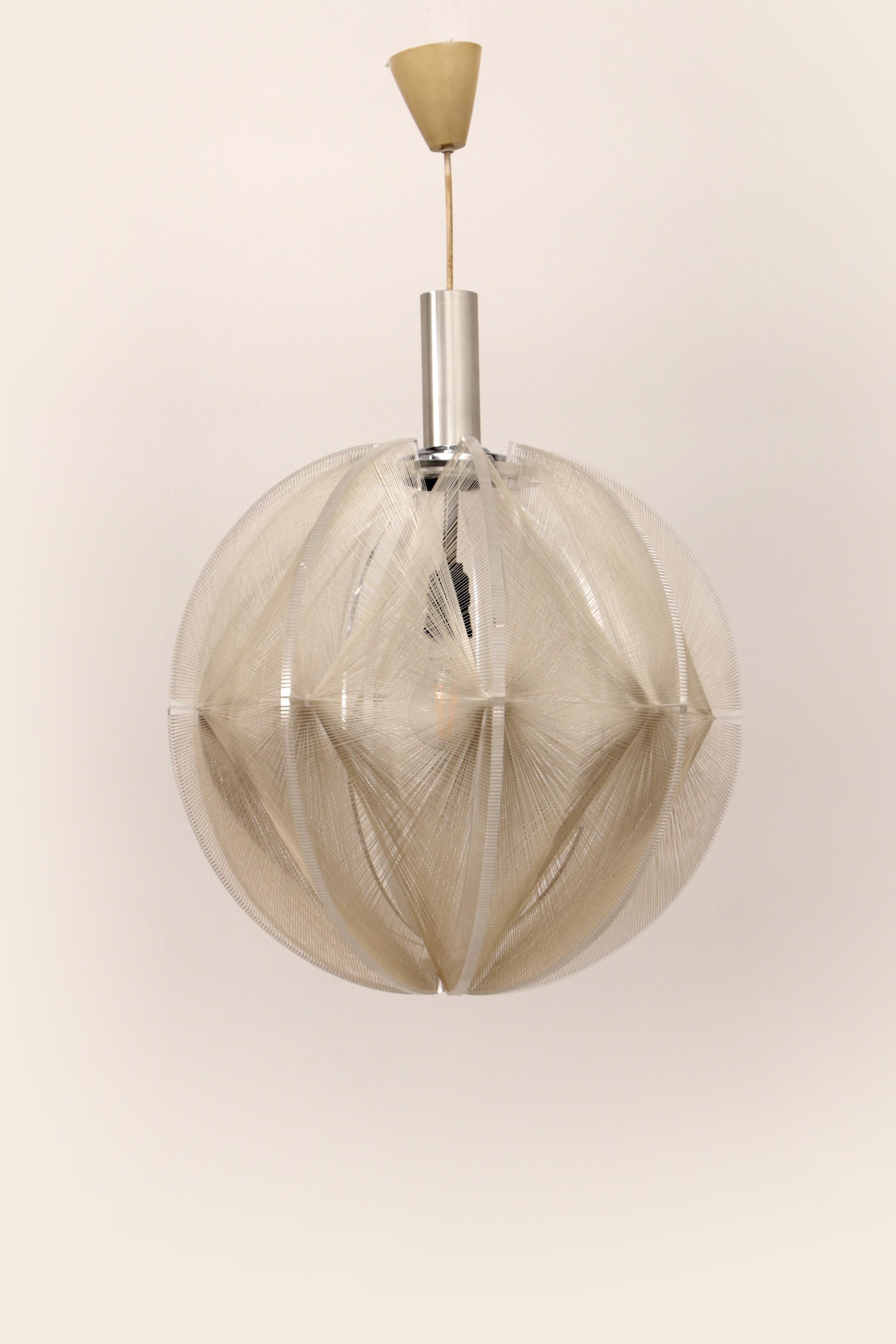 A beautiful pendant lamp from the 1960s, designed for Sompex by the French designer Paul Secon.

Made in Germany.

This lamp is also called Swag lamp. Material: perspex lamp in combination with nylon filament threads. Very unique in these