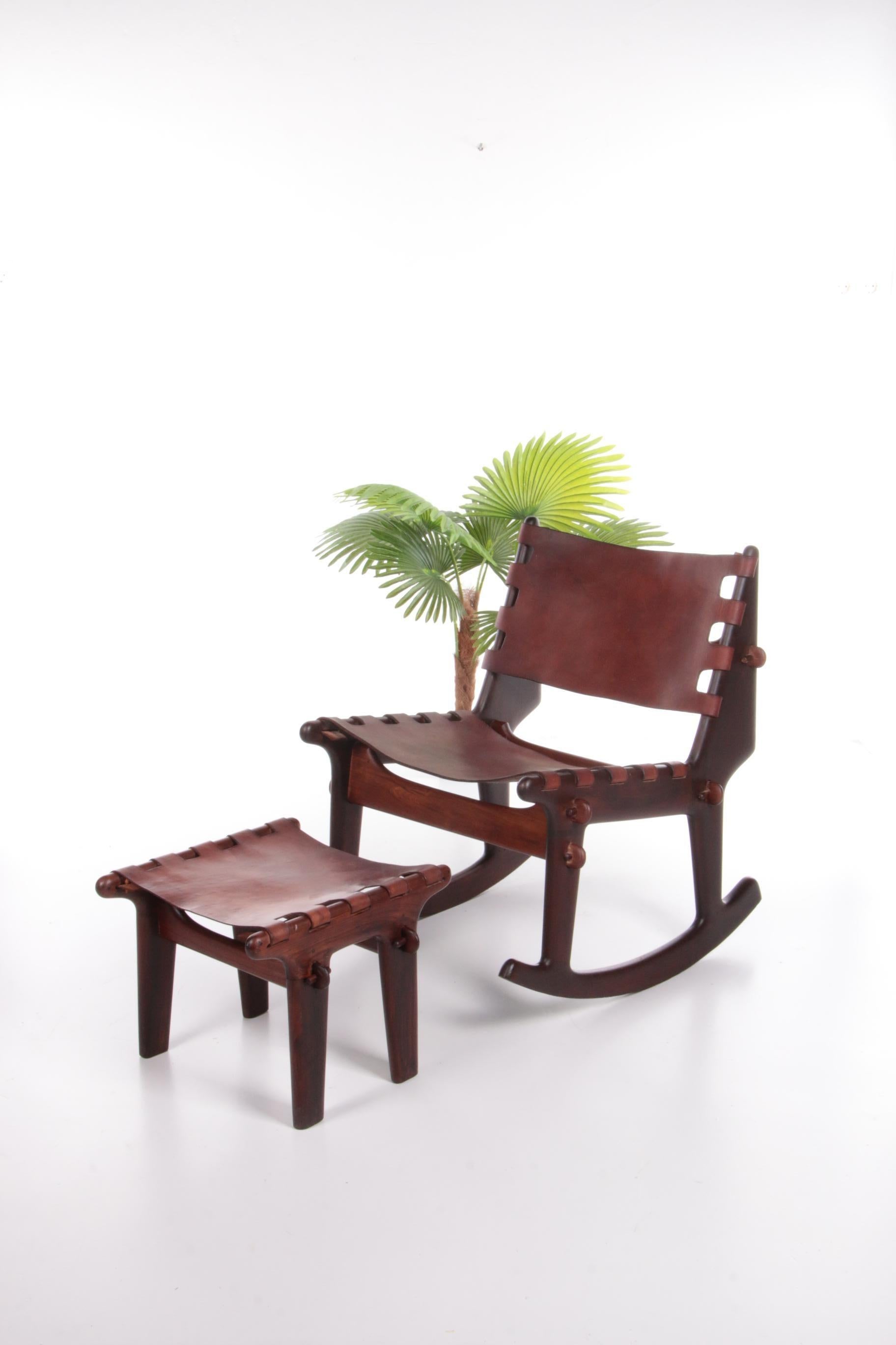 Original vintage design rocking chair from Ecuador.

Period: 1960s.

Made of Walnut wood. A design by Angel Pazmino for Muebles de Estilo.

This special rocking chair is unique in its kind and definitely a real eye-catcher in the